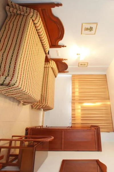 Photo of the whole room, Bed in El Cisne Verde