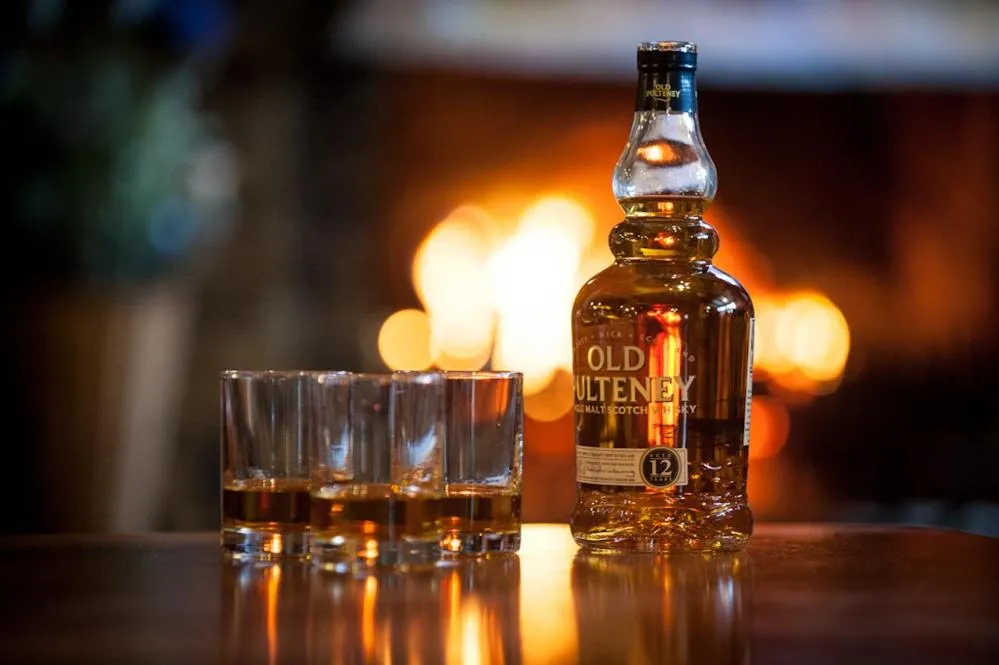 Communal lounge/ TV room in Loch Ness Lodge Hotel