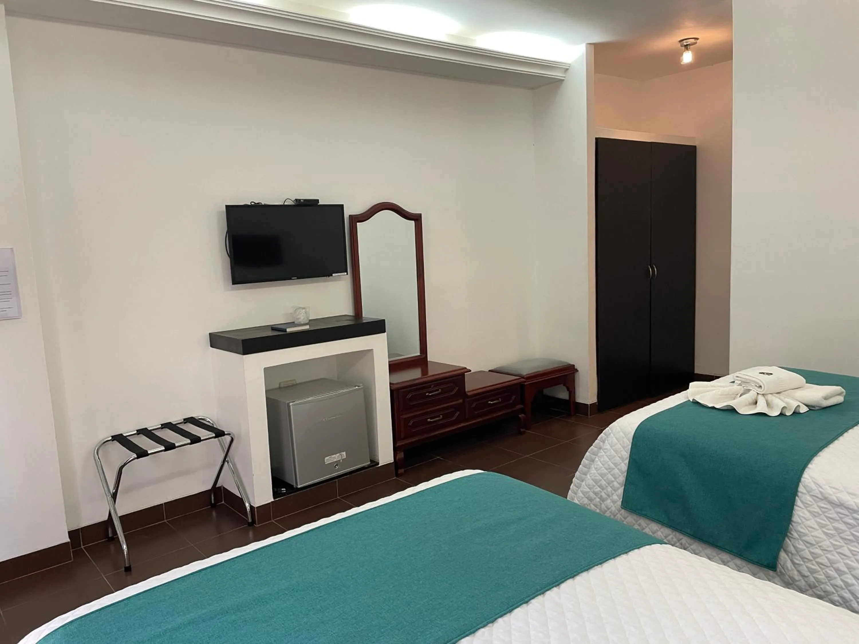 Photo of the whole room, Bed in Hosteria Punta Blanca