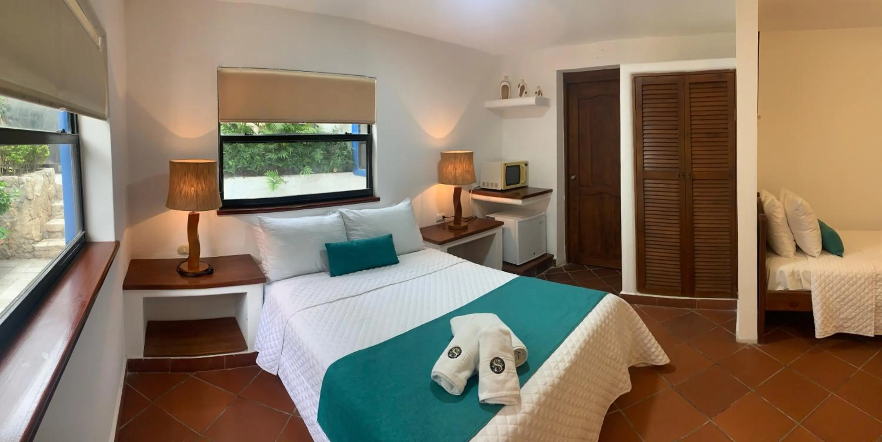 Bed in Hosteria Punta Blanca