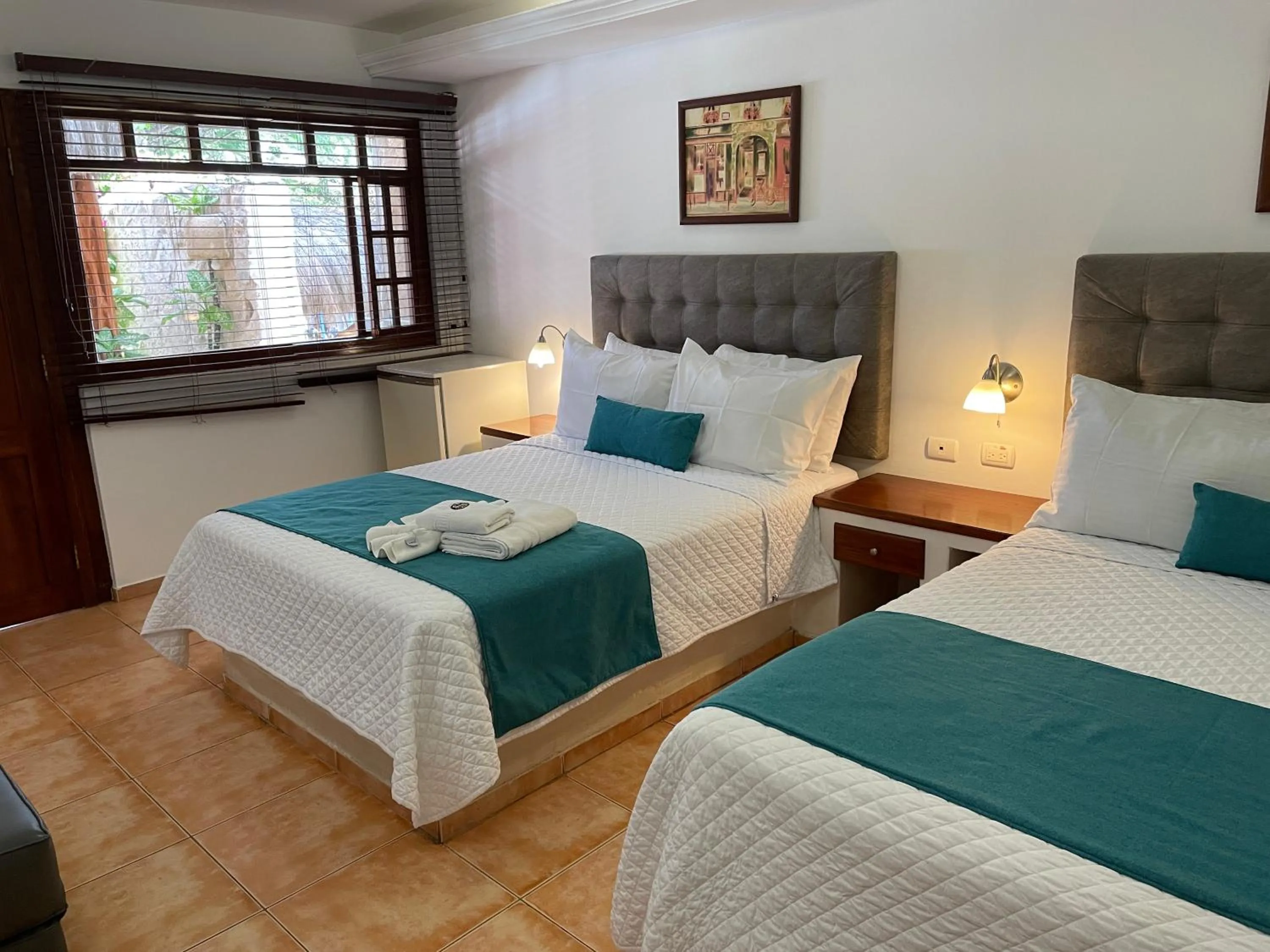 Photo of the whole room, Bed in Hosteria Punta Blanca