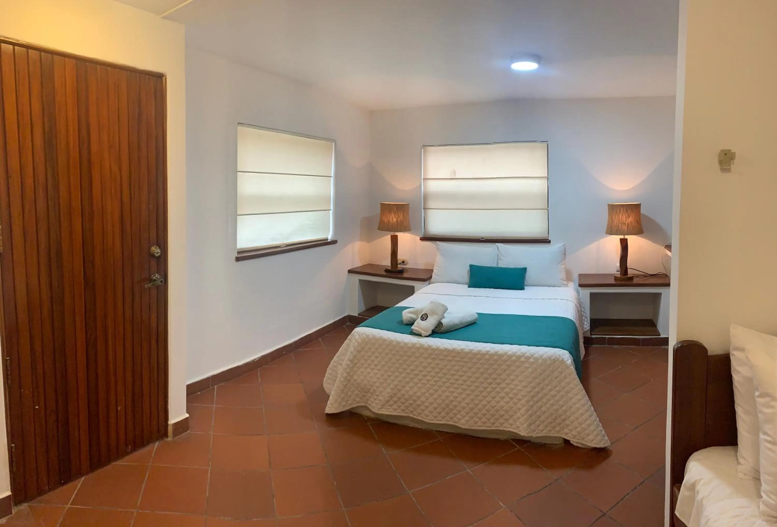 Bedroom, Bed in Hosteria Punta Blanca
