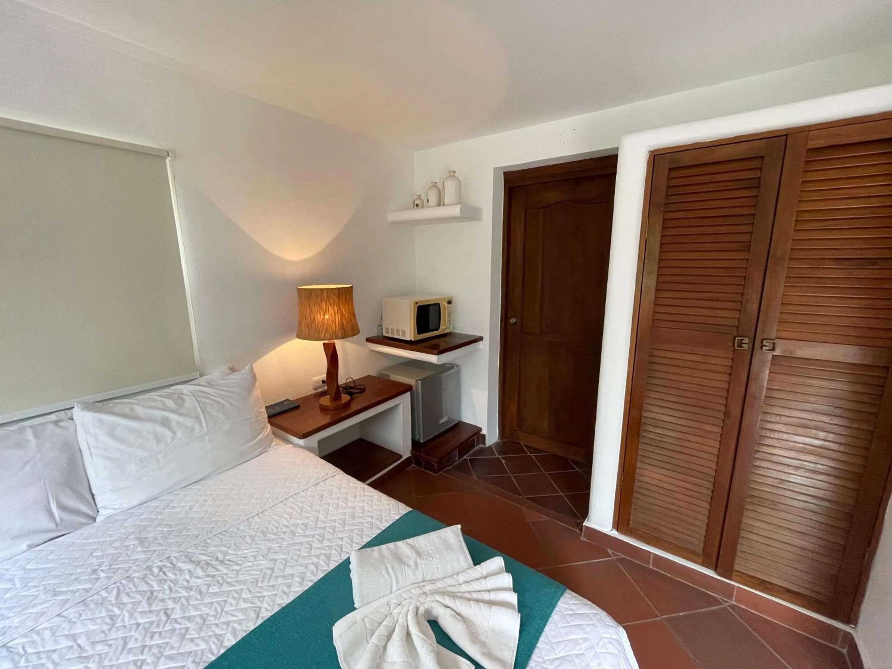 Bed in Hosteria Punta Blanca