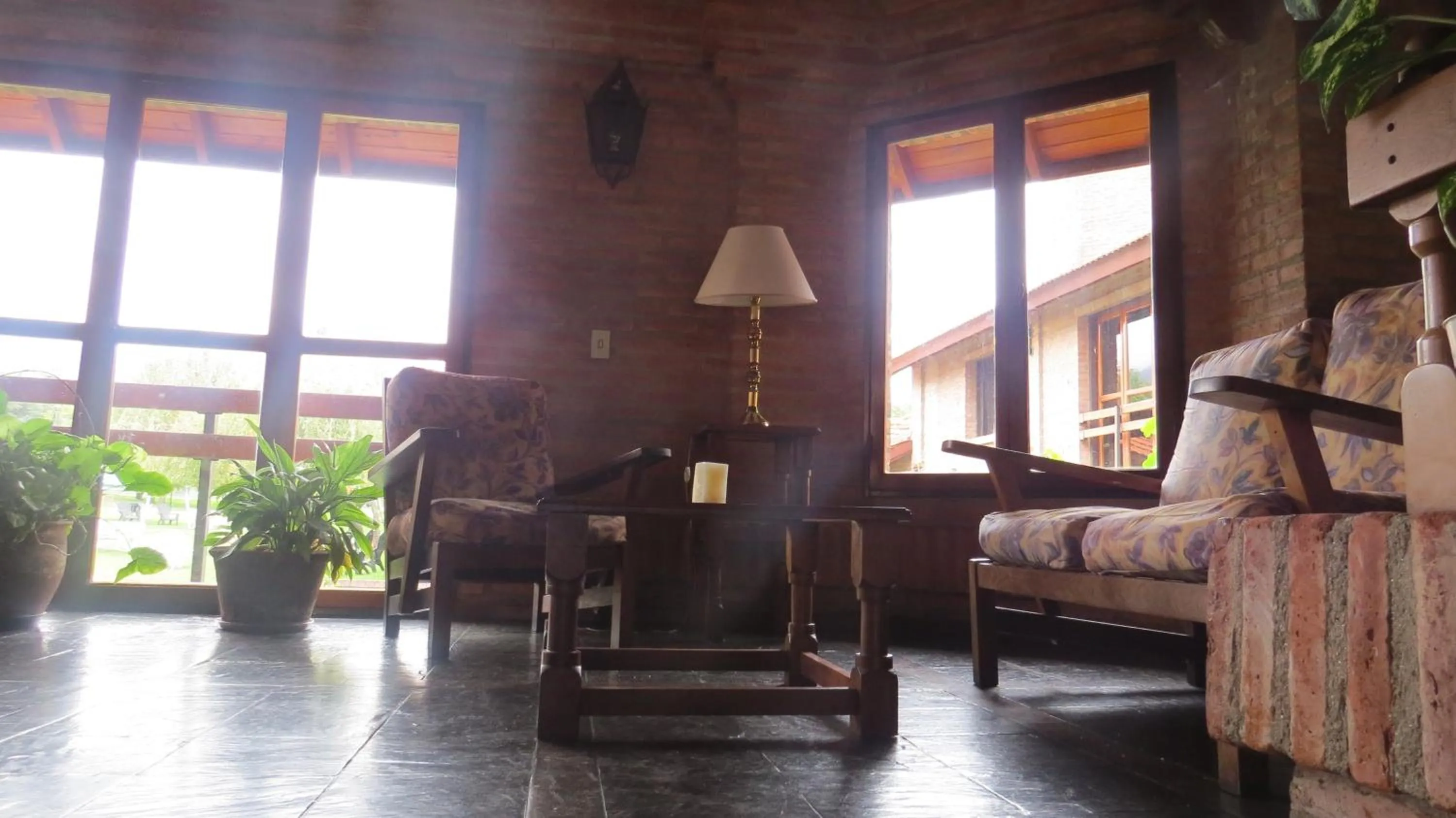 Communal lounge/ TV room in Villa de Merlo All Inclusive & Spa by MH