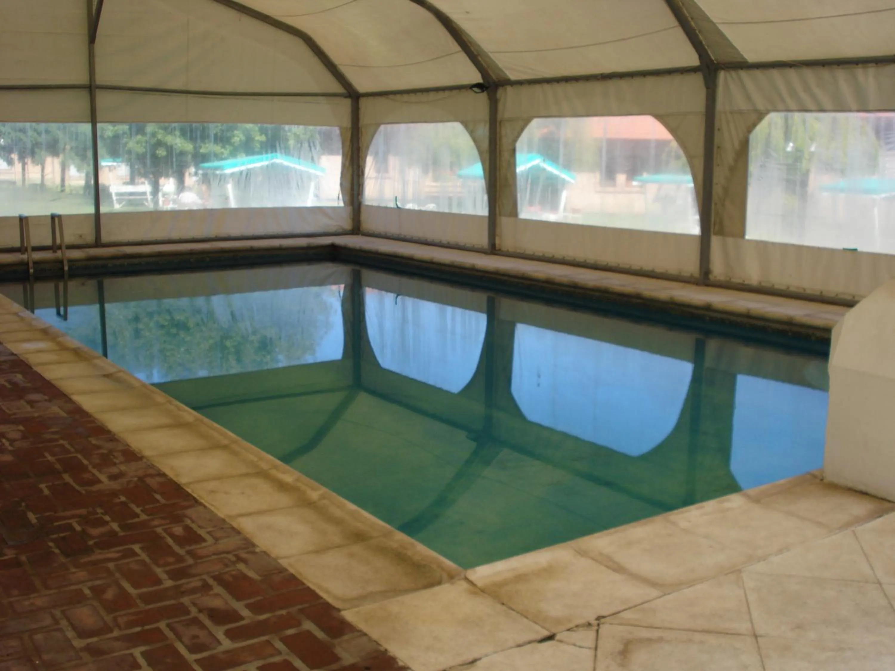 Swimming pool in Villa de Merlo All Inclusive & Spa by MH