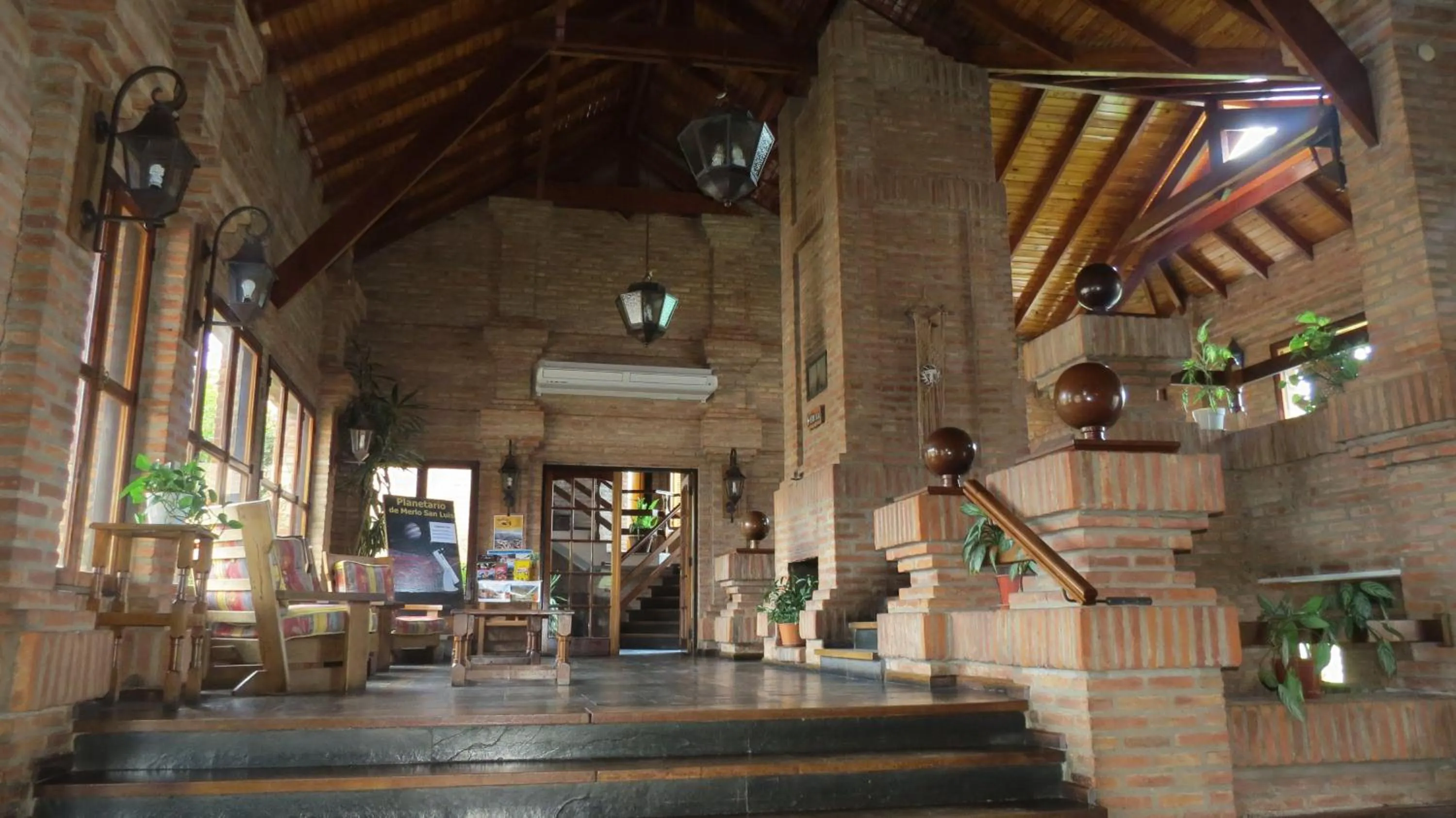 Communal lounge/ TV room in Villa de Merlo All Inclusive & Spa by MH