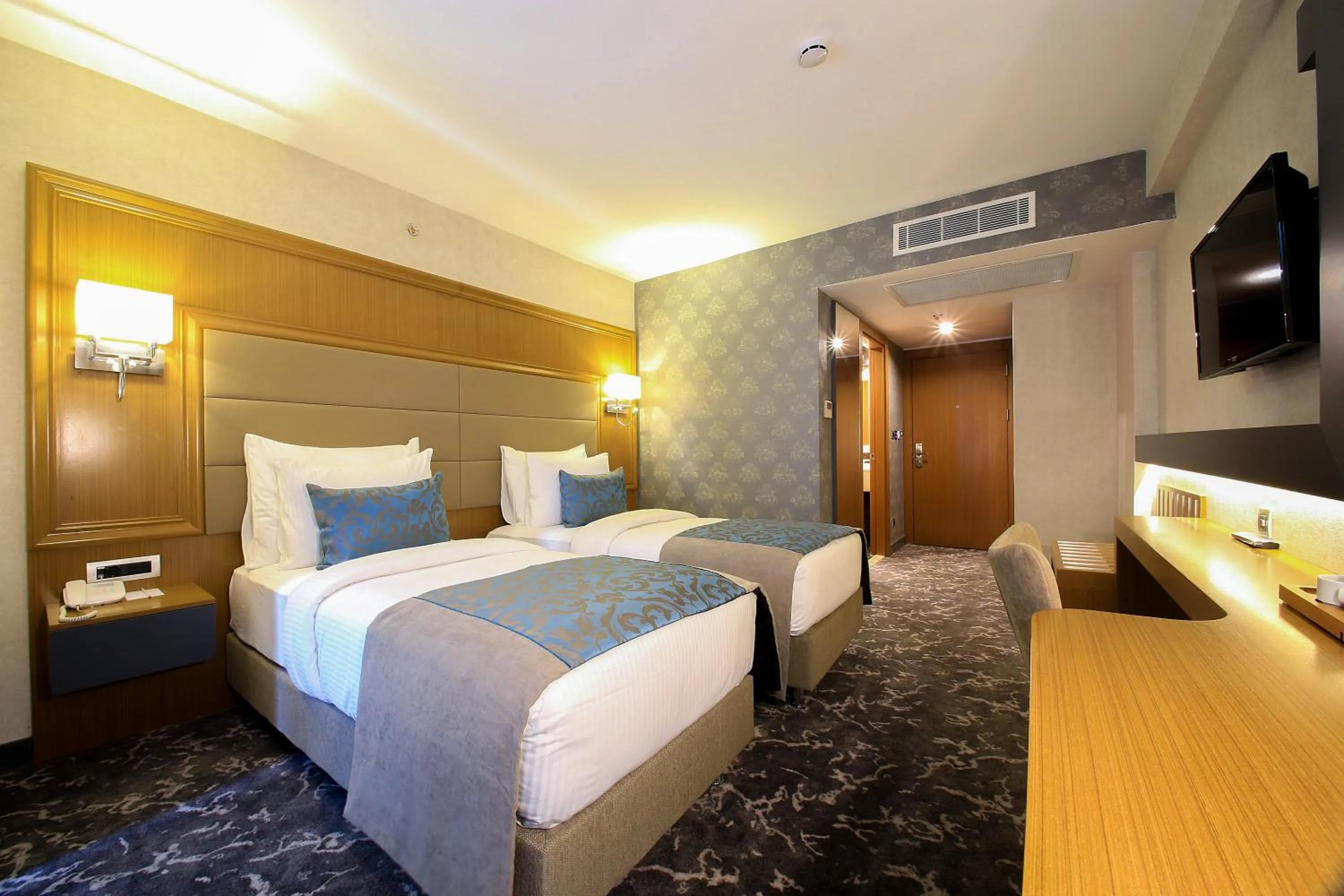 Bed in AYMİRA HOTEL & SPA