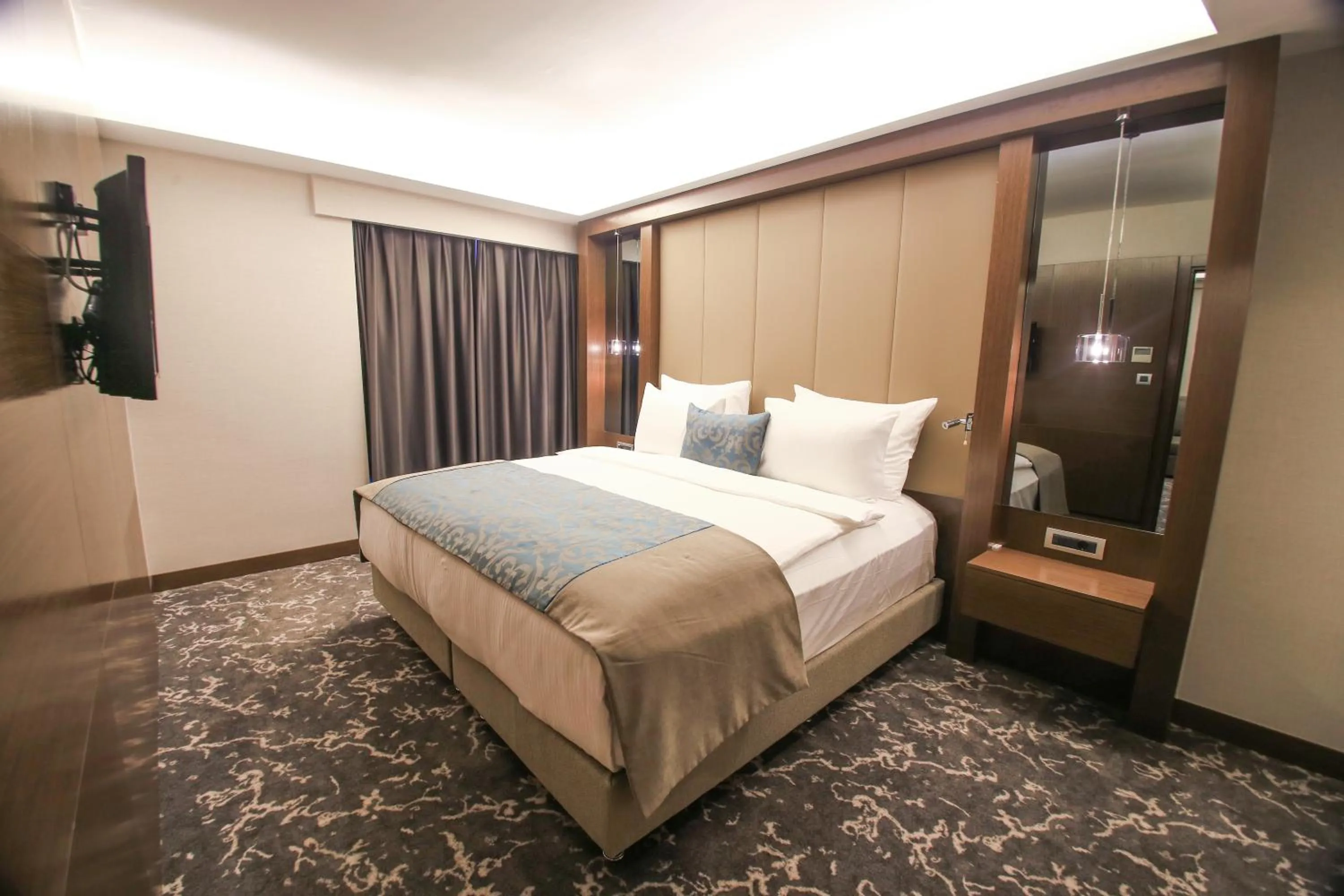 Bed in AYMİRA HOTEL & SPA
