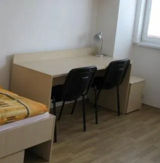 Seating area, Bed in Uninova Hostel