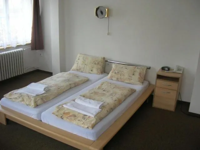 Bed in Hotel Slovan
