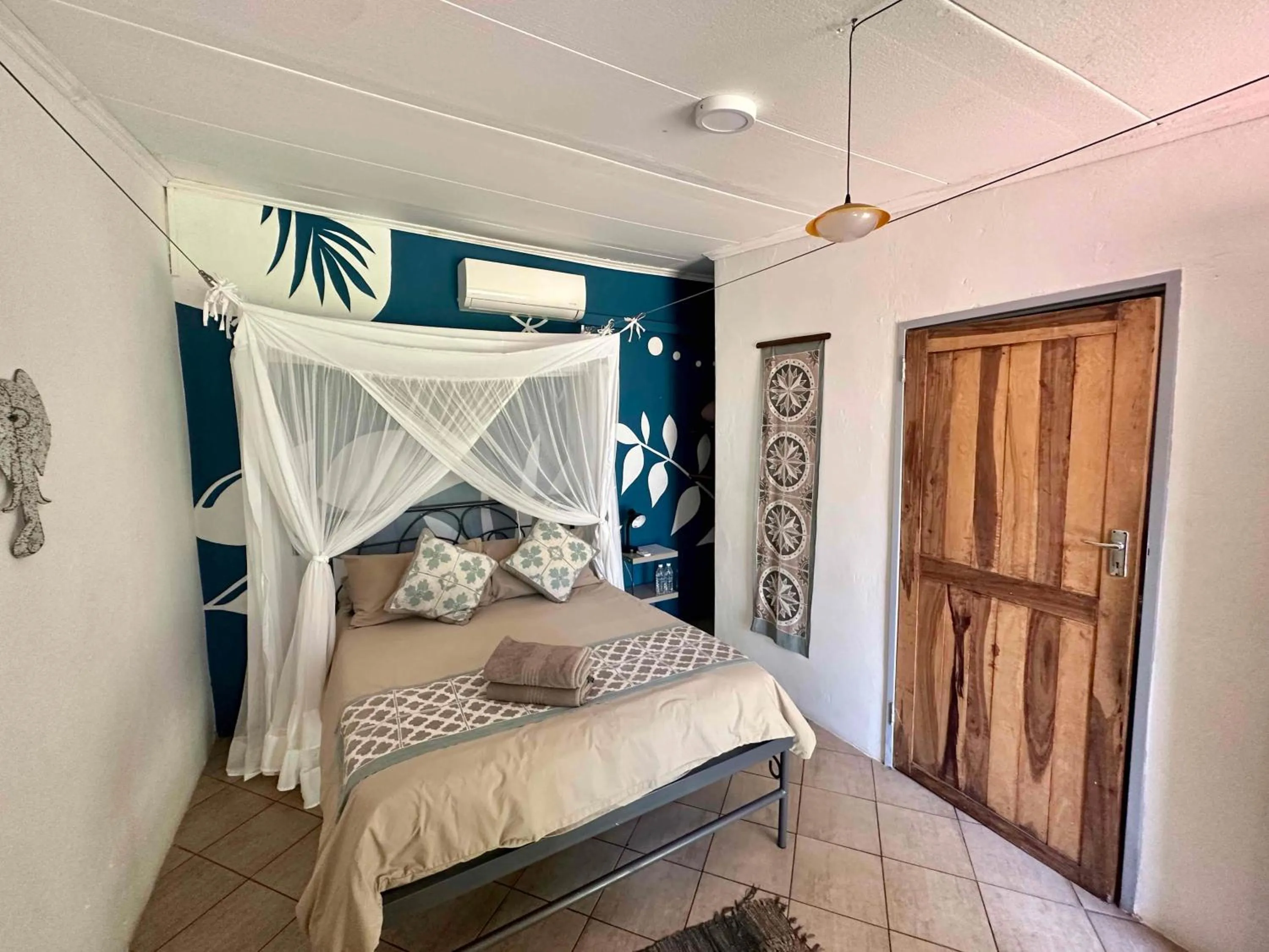 Bed in Fawlty Towers Accommodation & Activities