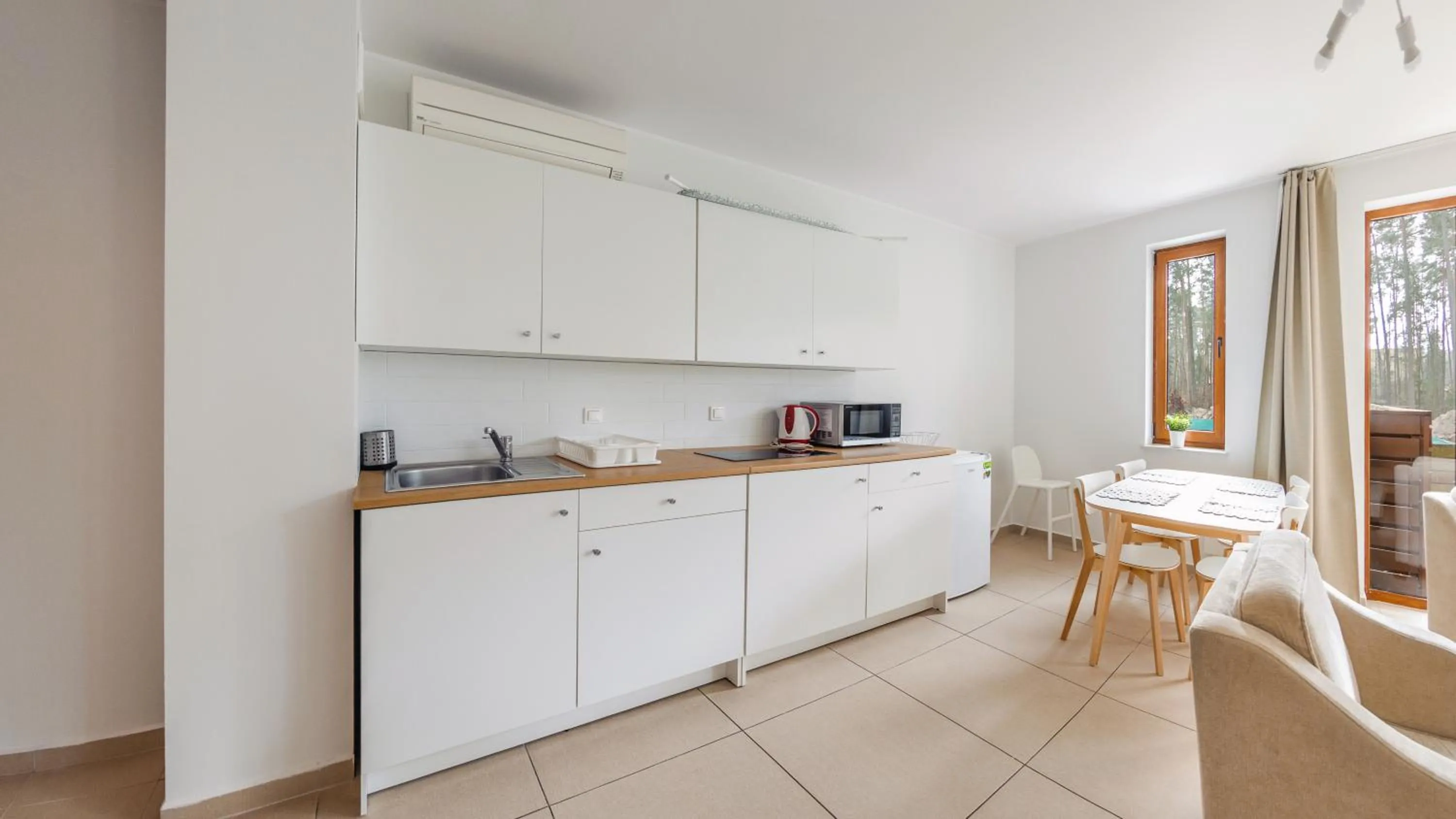 Kitchen or kitchenette in Baltic Park Stegna, Sun & Snow