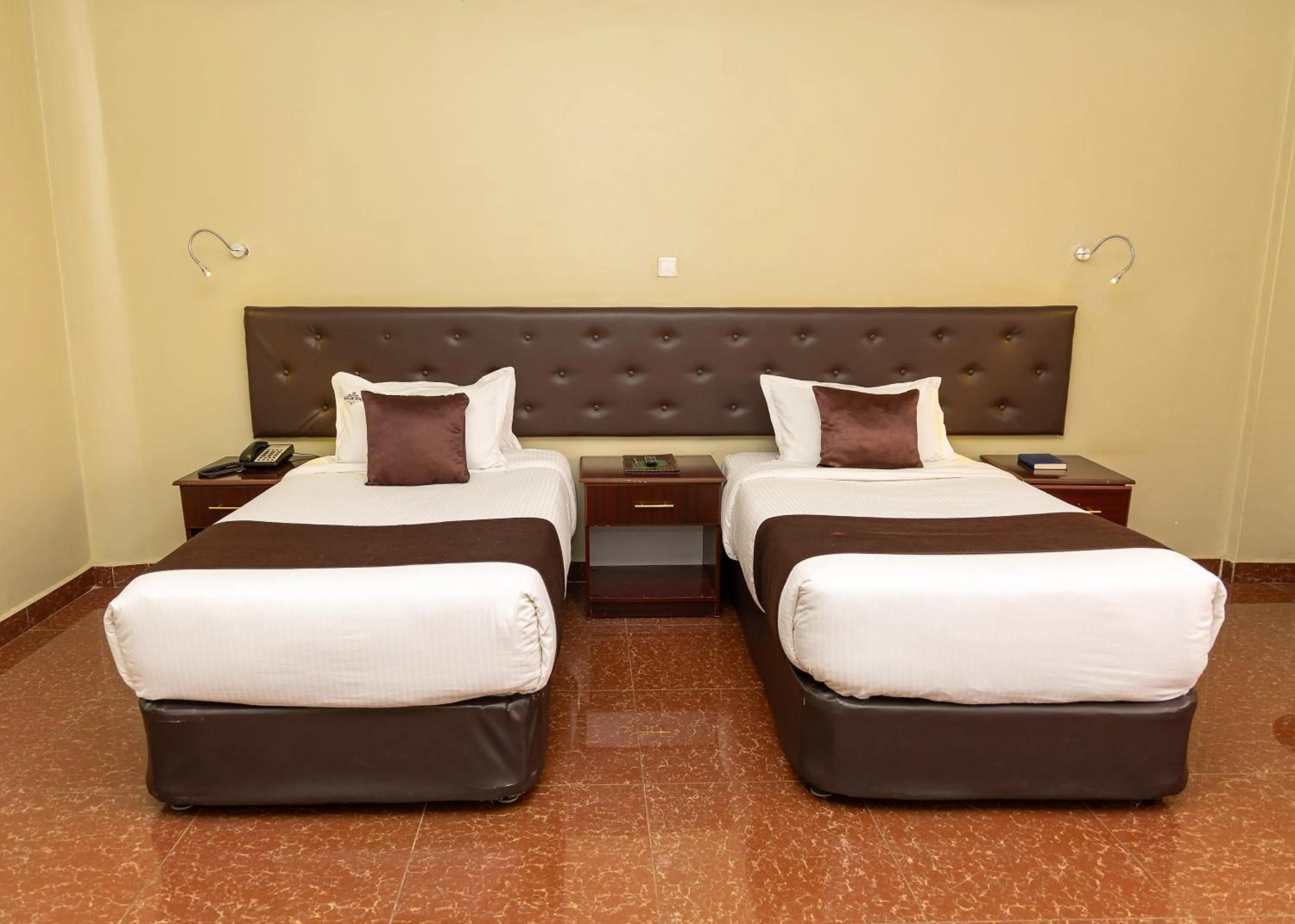Bed in Maxland Hotel