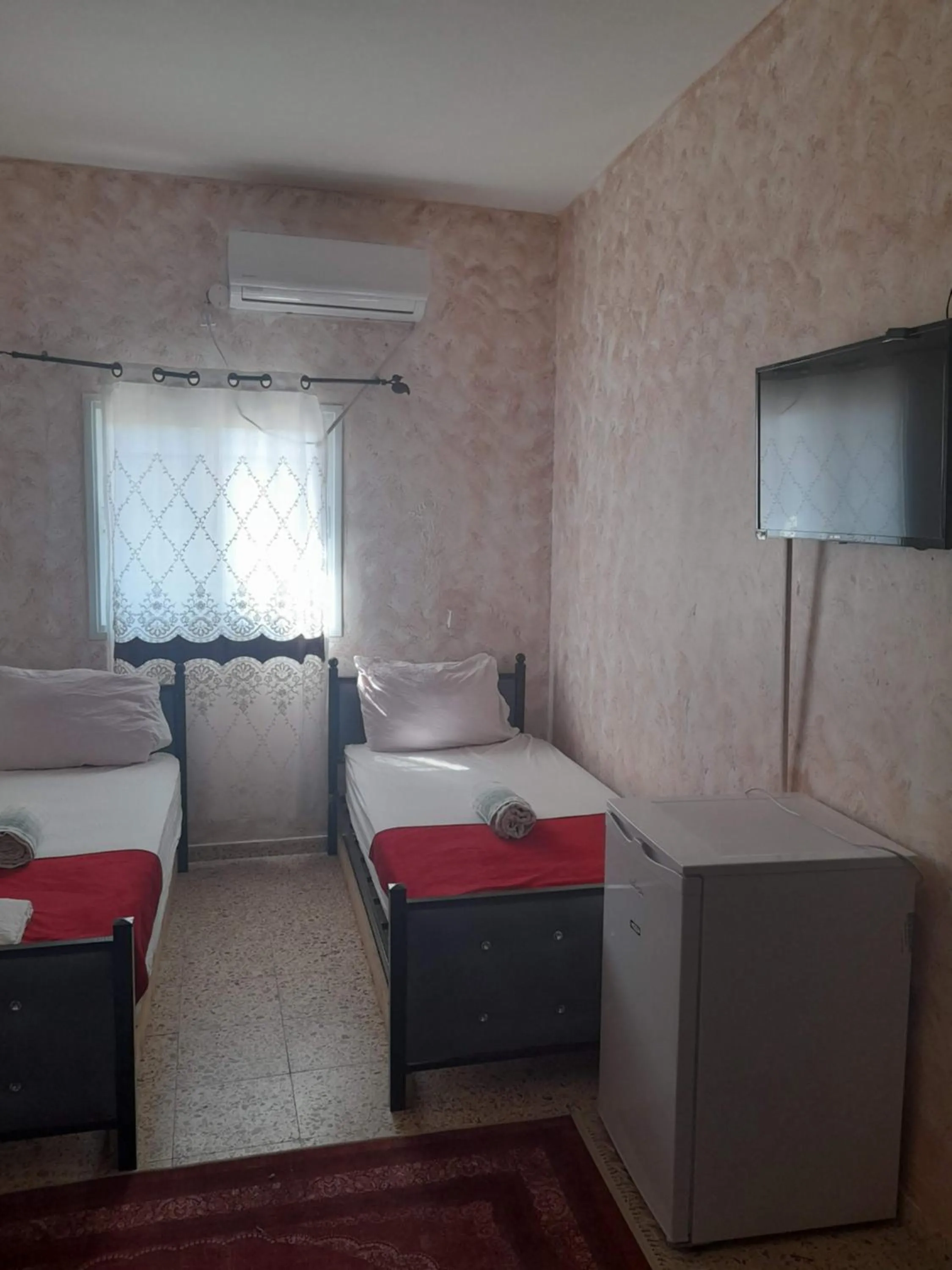 Bed in Magtas Hotel
