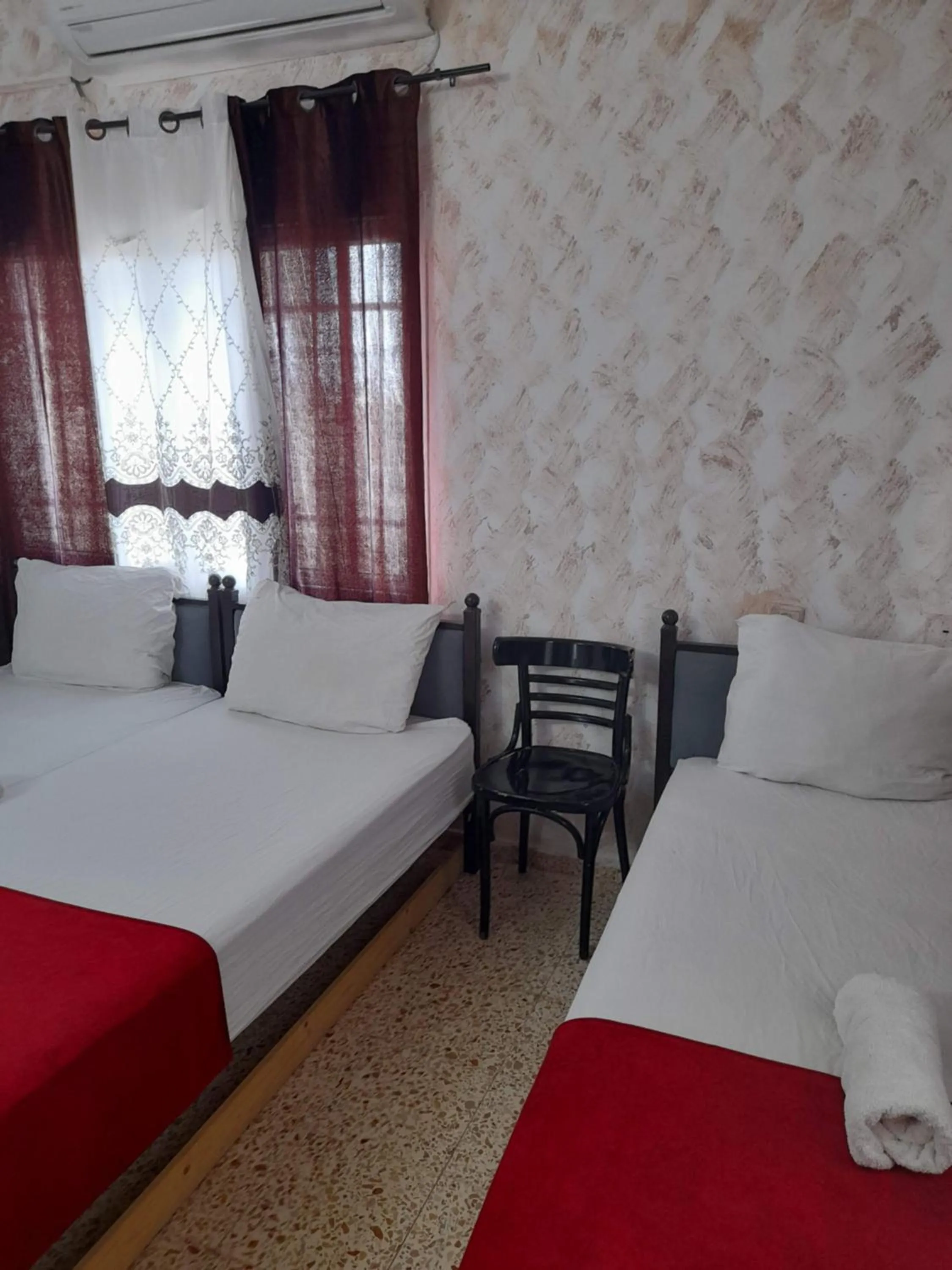 Bed in Magtas Hotel