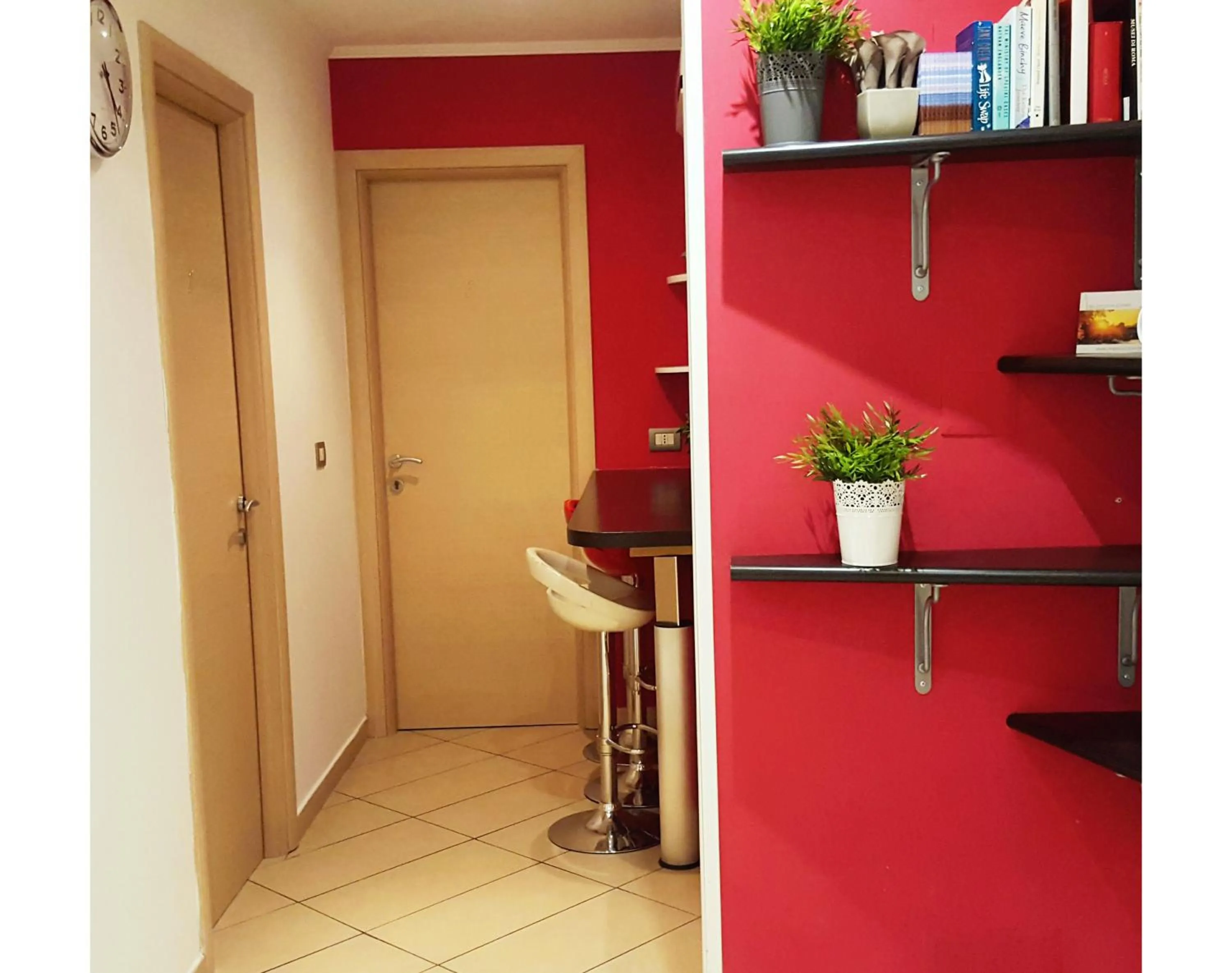 Communal lounge/ TV room in B&B Emozioni Romane