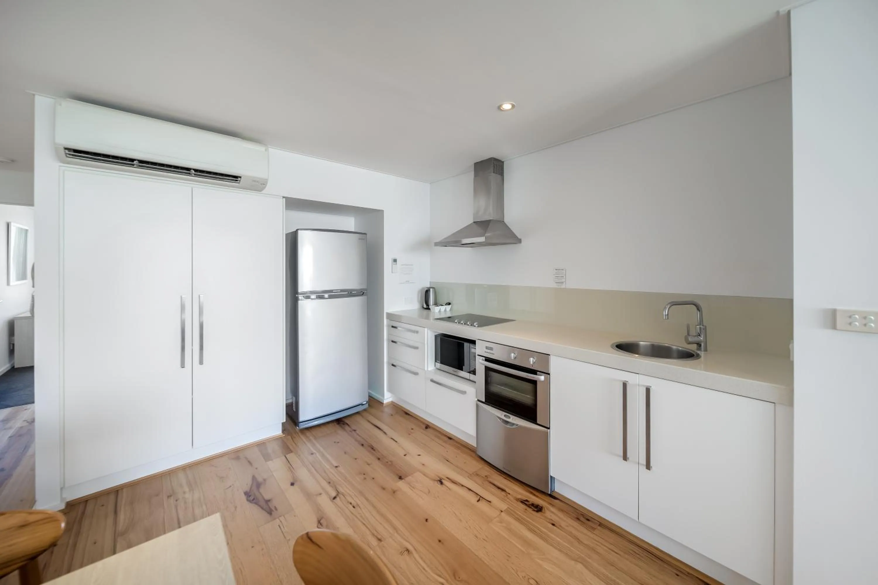 Kitchen or kitchenette in Oaks Nelson Bay Lure Suites