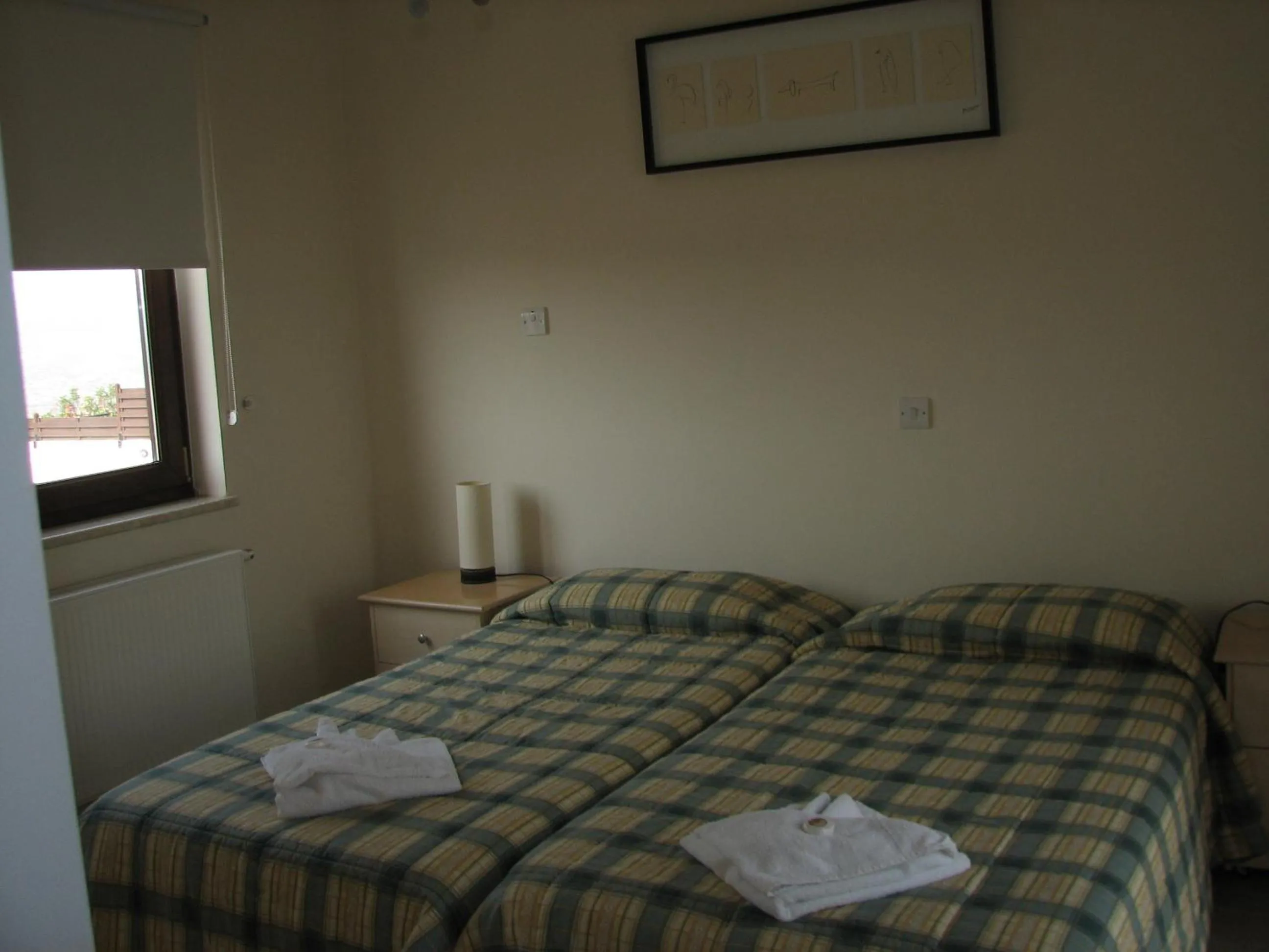 Bed in Hill View Hotel Apartments