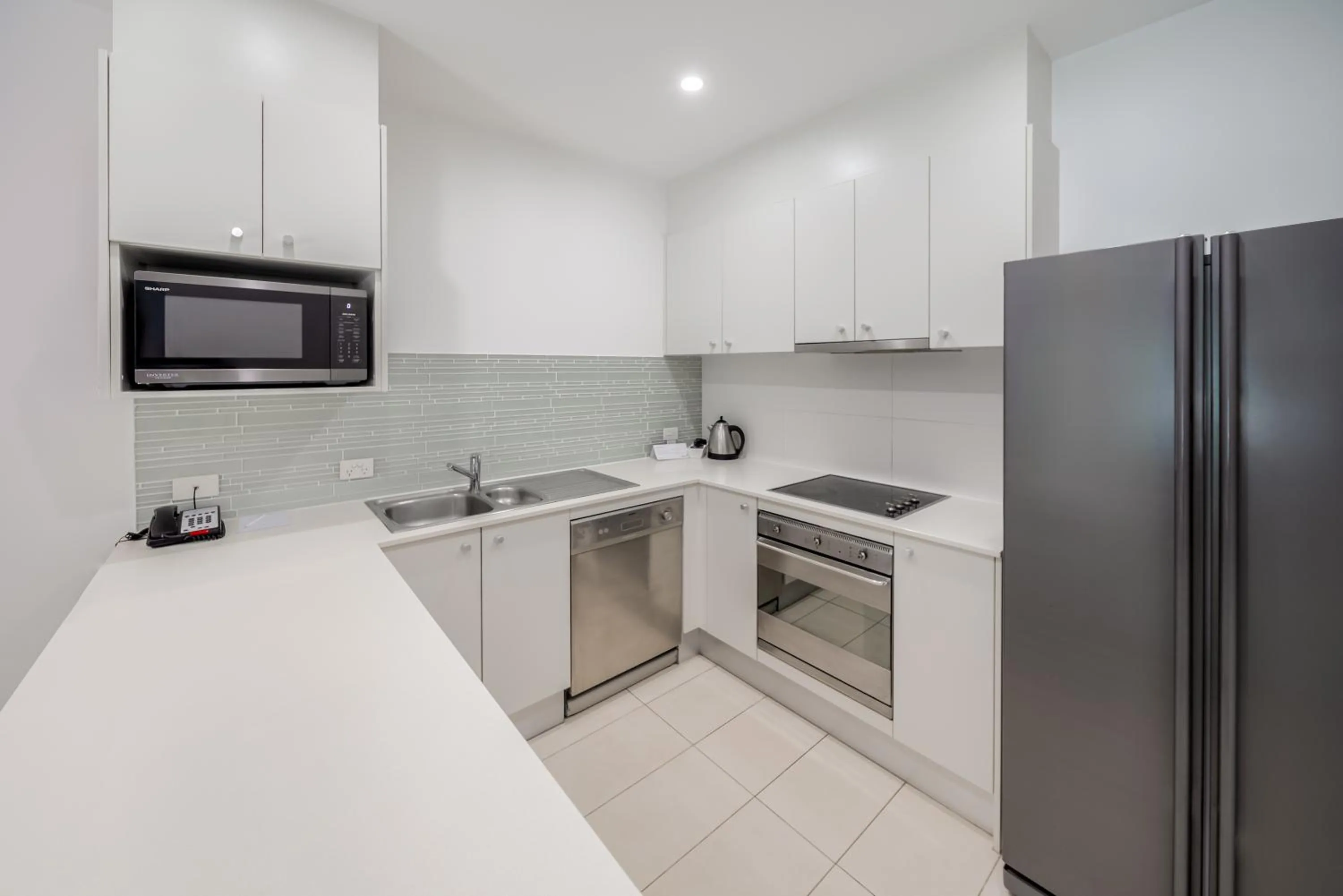 Kitchen or kitchenette in Oaks Port Stephens Pacific Blue Resort