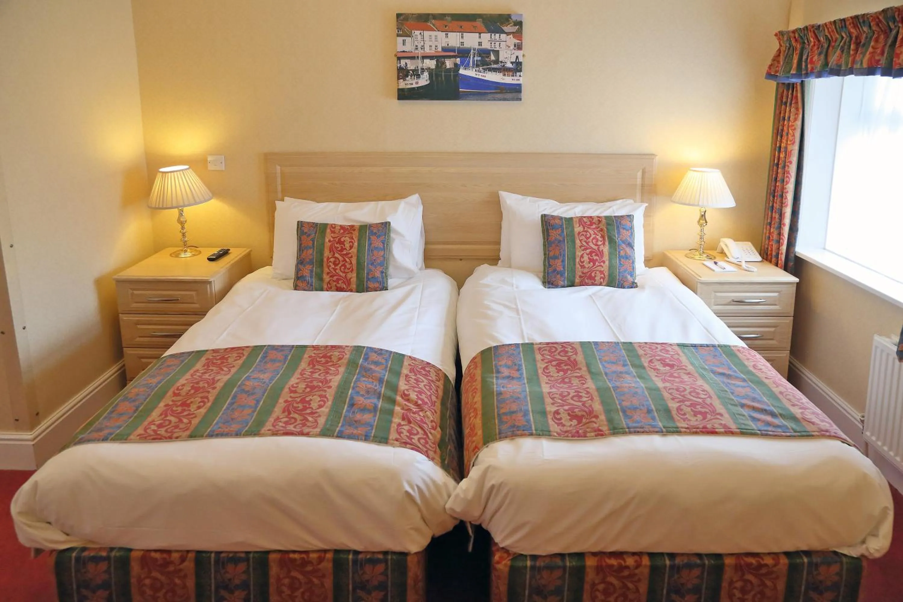 Bed in Saxonville Hotel