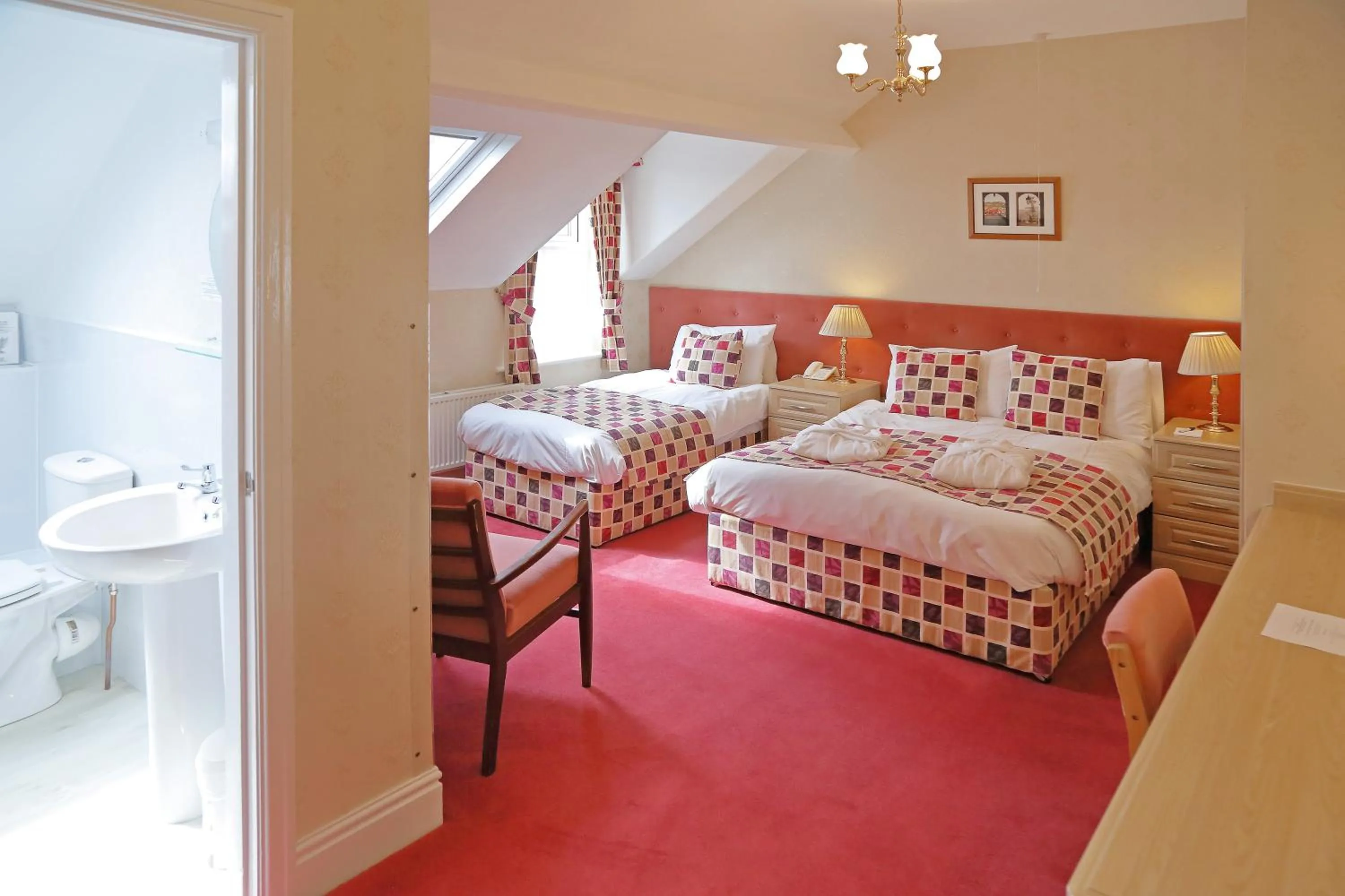 Bed in Saxonville Hotel