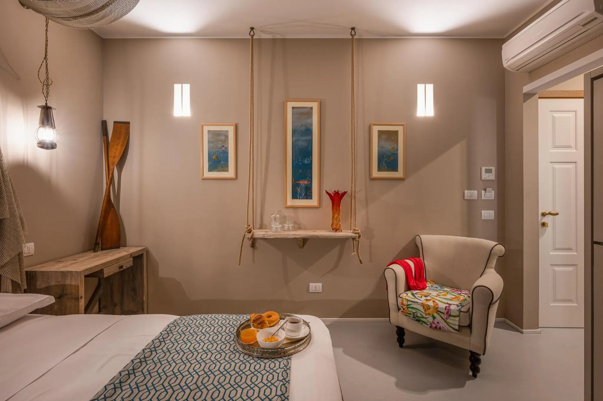 Bed in A'Mare Luxury Rooms