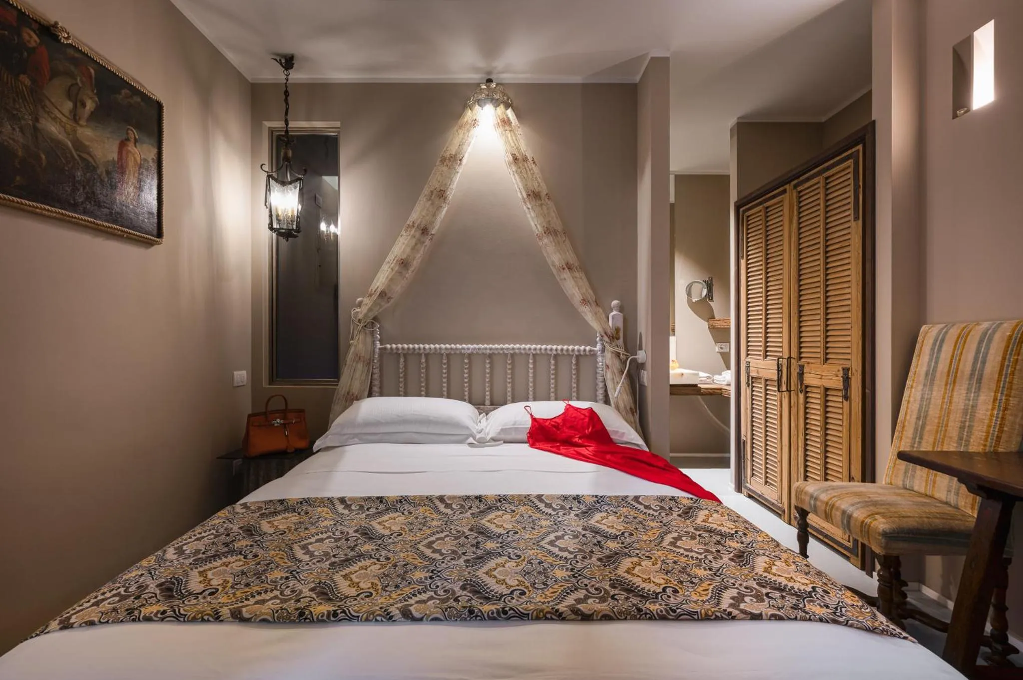 Bed in A'Mare Luxury Rooms