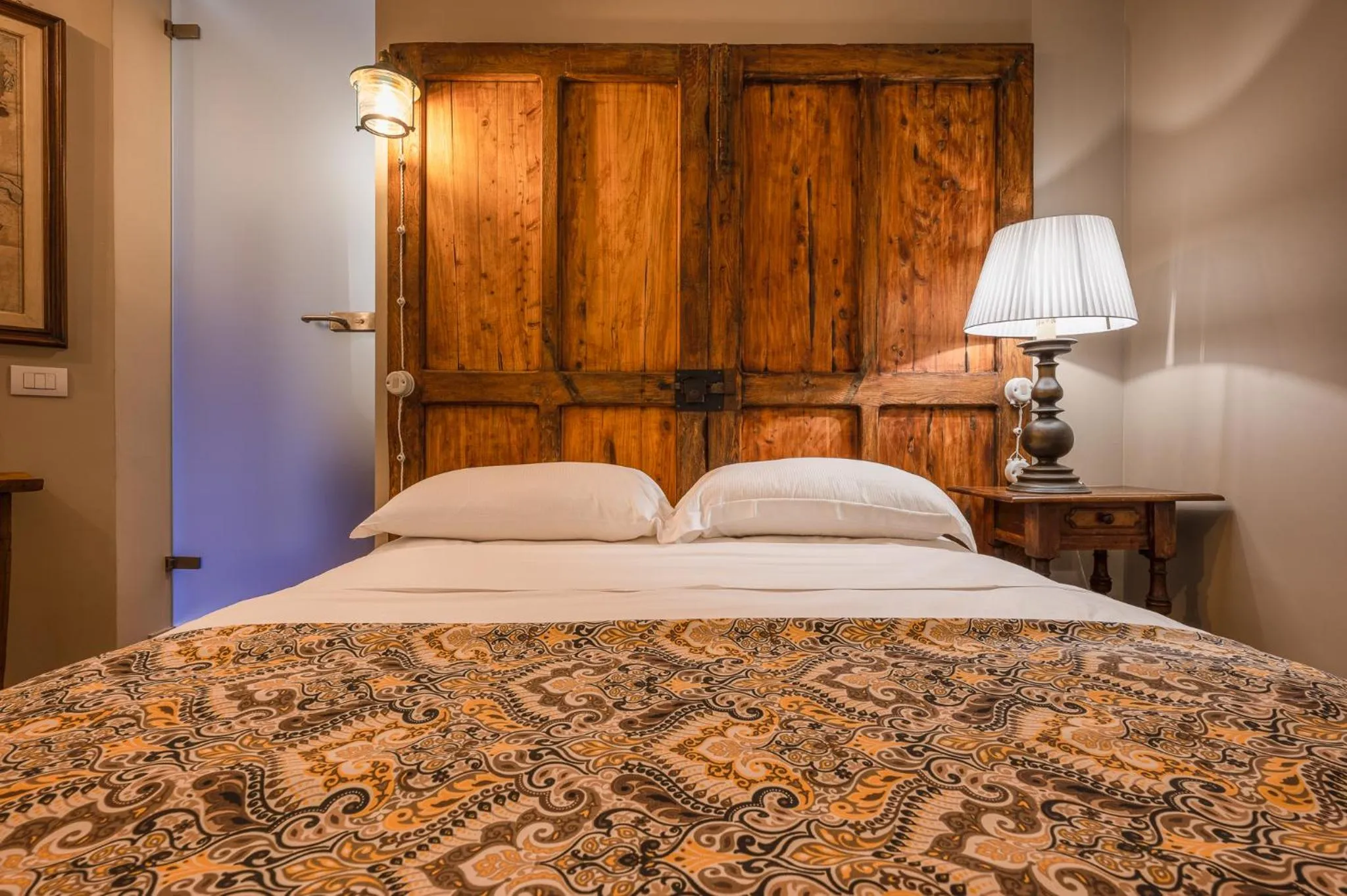 Bed in A'Mare Luxury Rooms