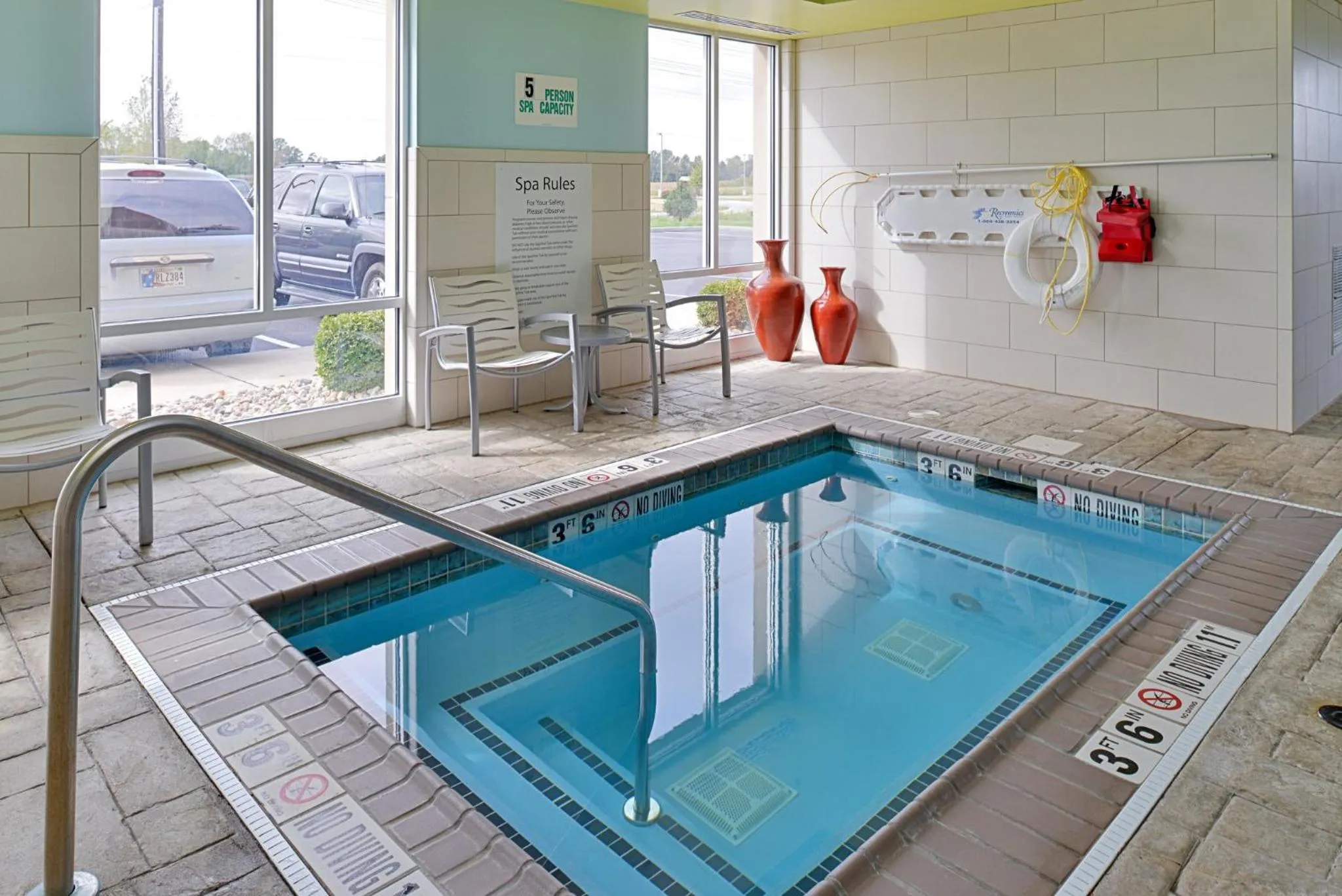 Swimming pool in Holiday Inn Express Hotel & Suites Terre Haute by IHG