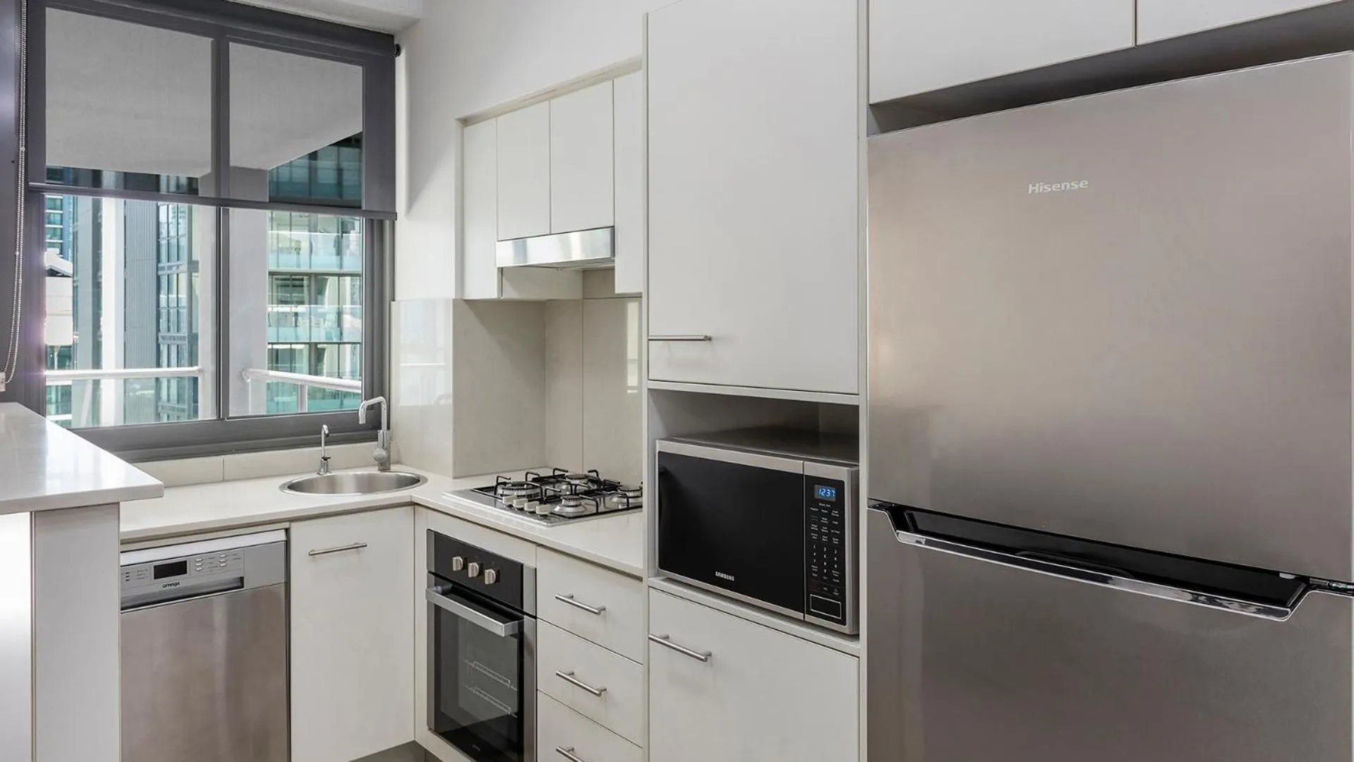 Kitchen or kitchenette in Oaks Brisbane on Margaret Suites