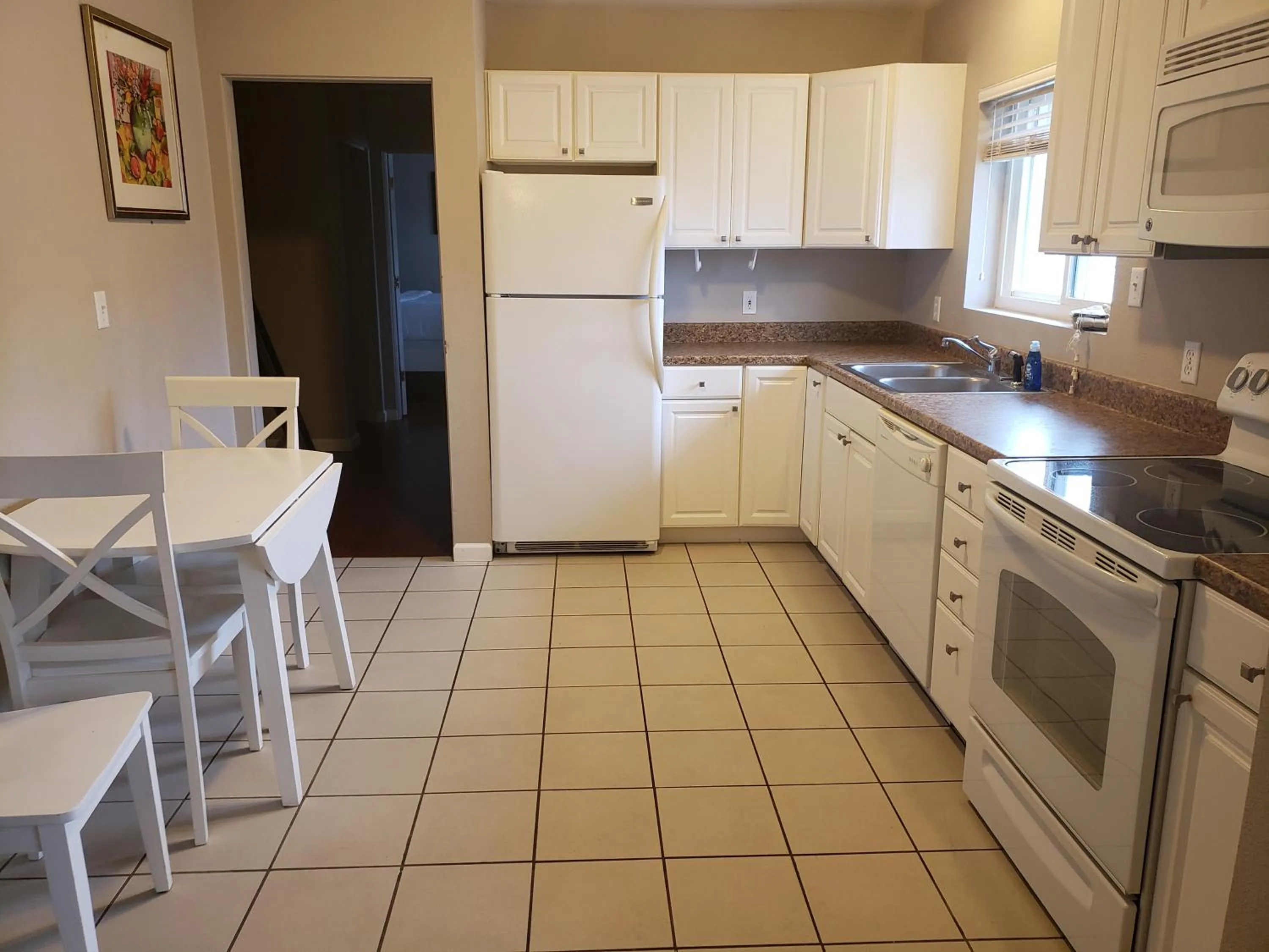 Kitchen or kitchenette in Travelodge by Wyndham Traverse City MI