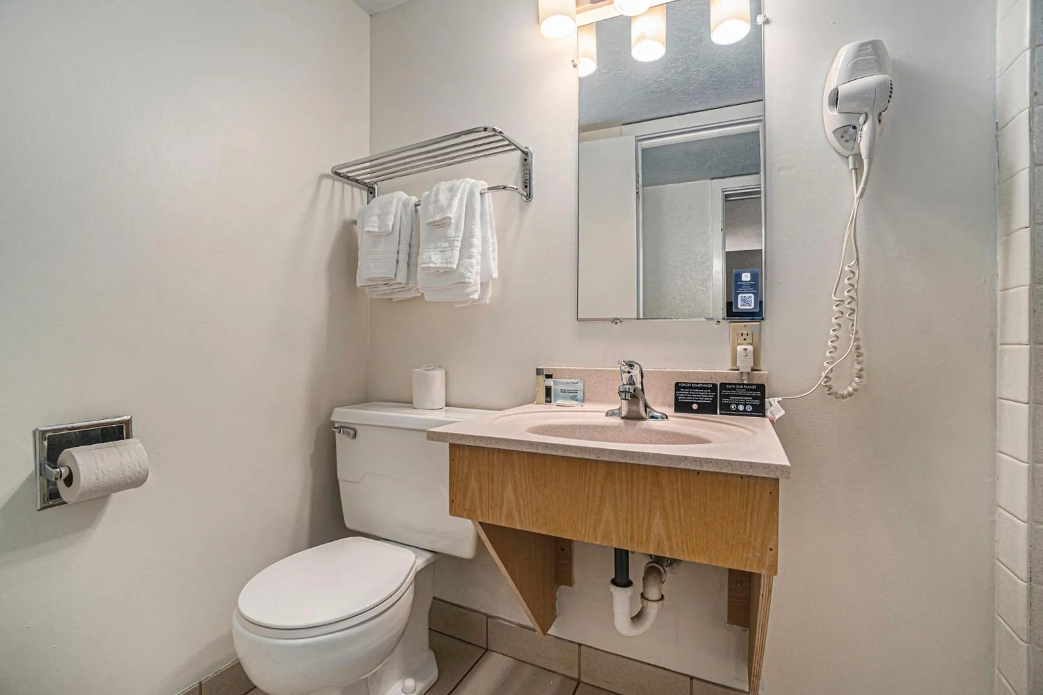 Bathroom in Travelodge by Wyndham Traverse City MI