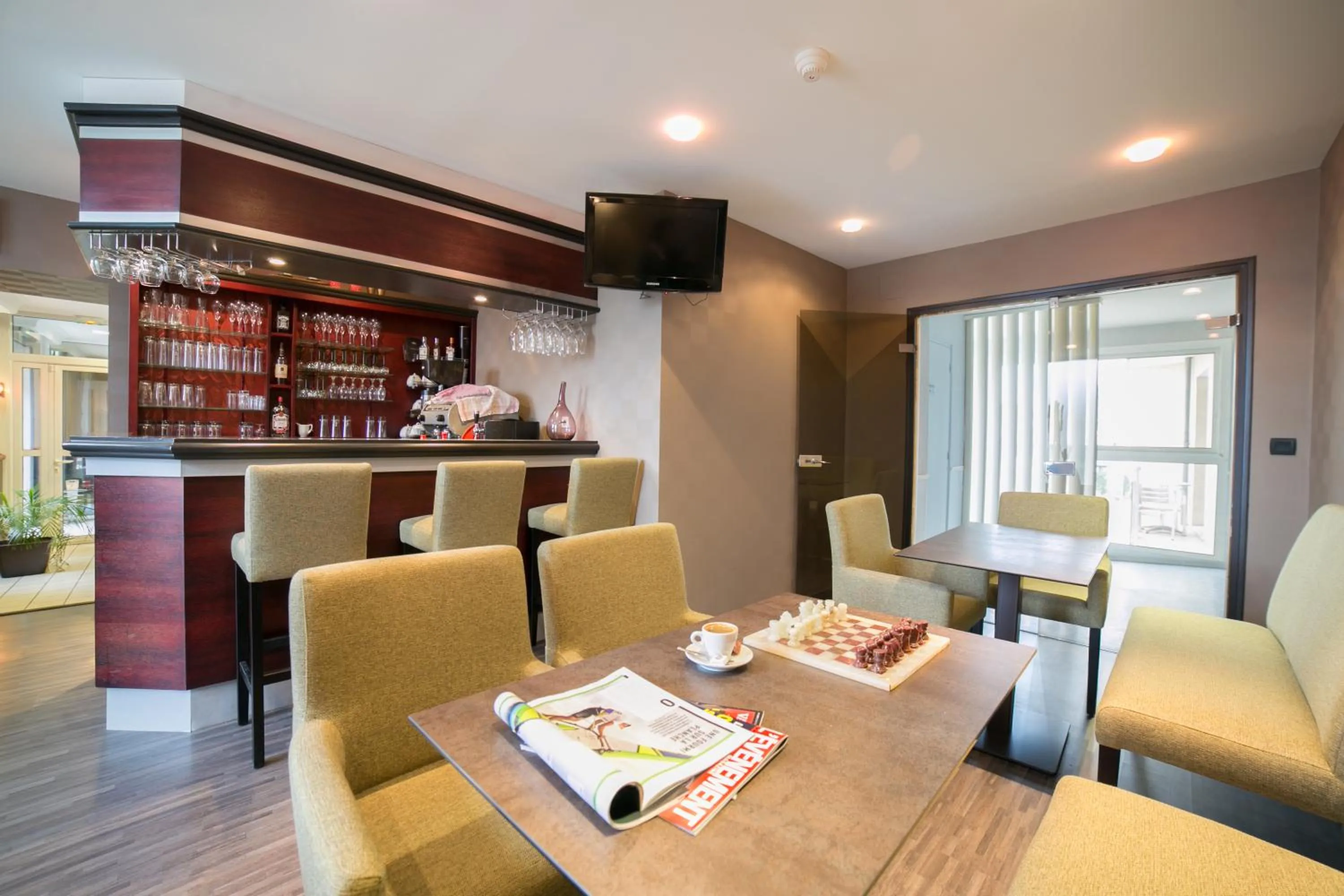 Communal lounge/ TV room in Hotel Beau Rivage