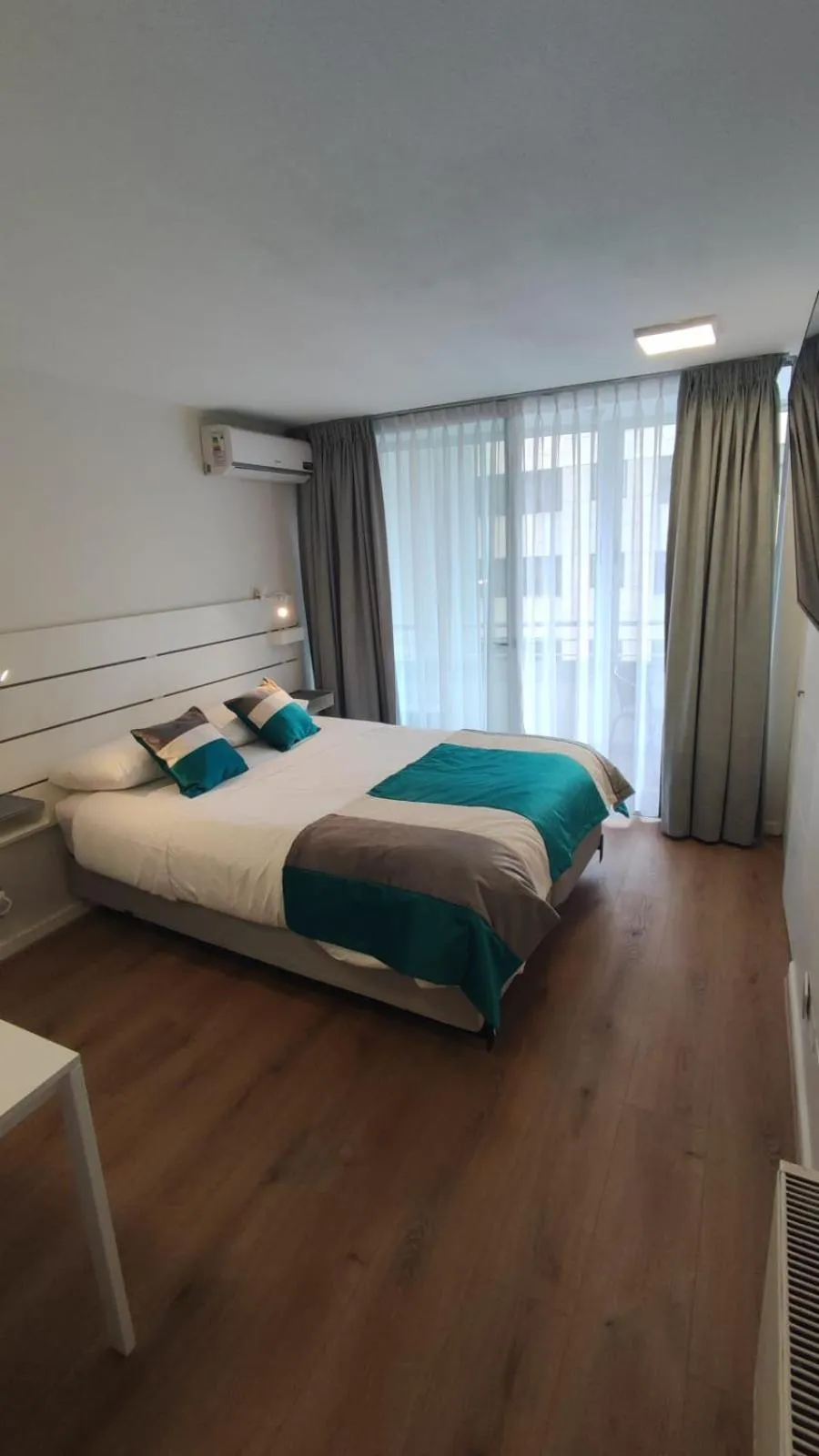 Bed in Apart Lyon Suite