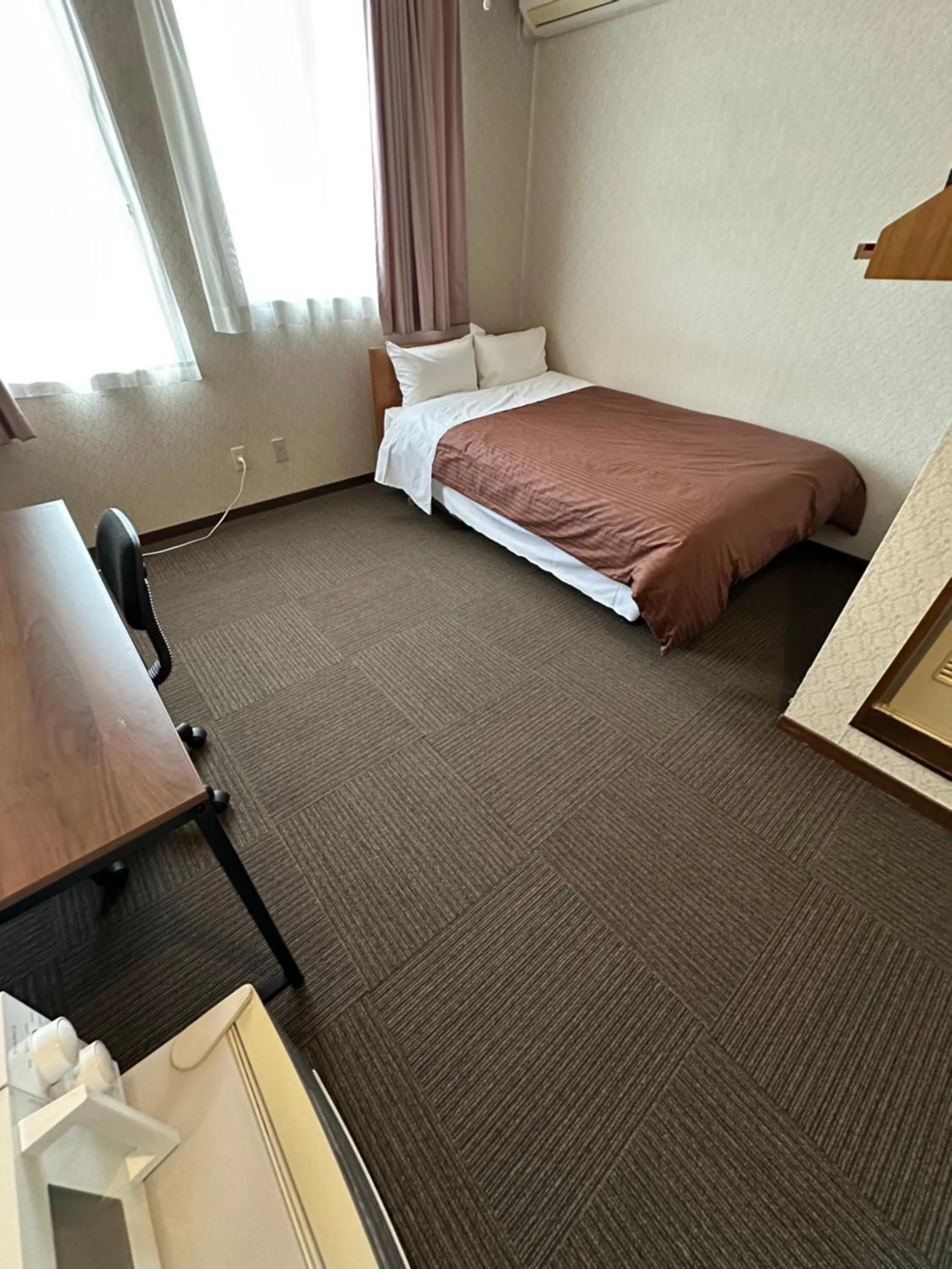 Bed in Business Hotel Ishimura