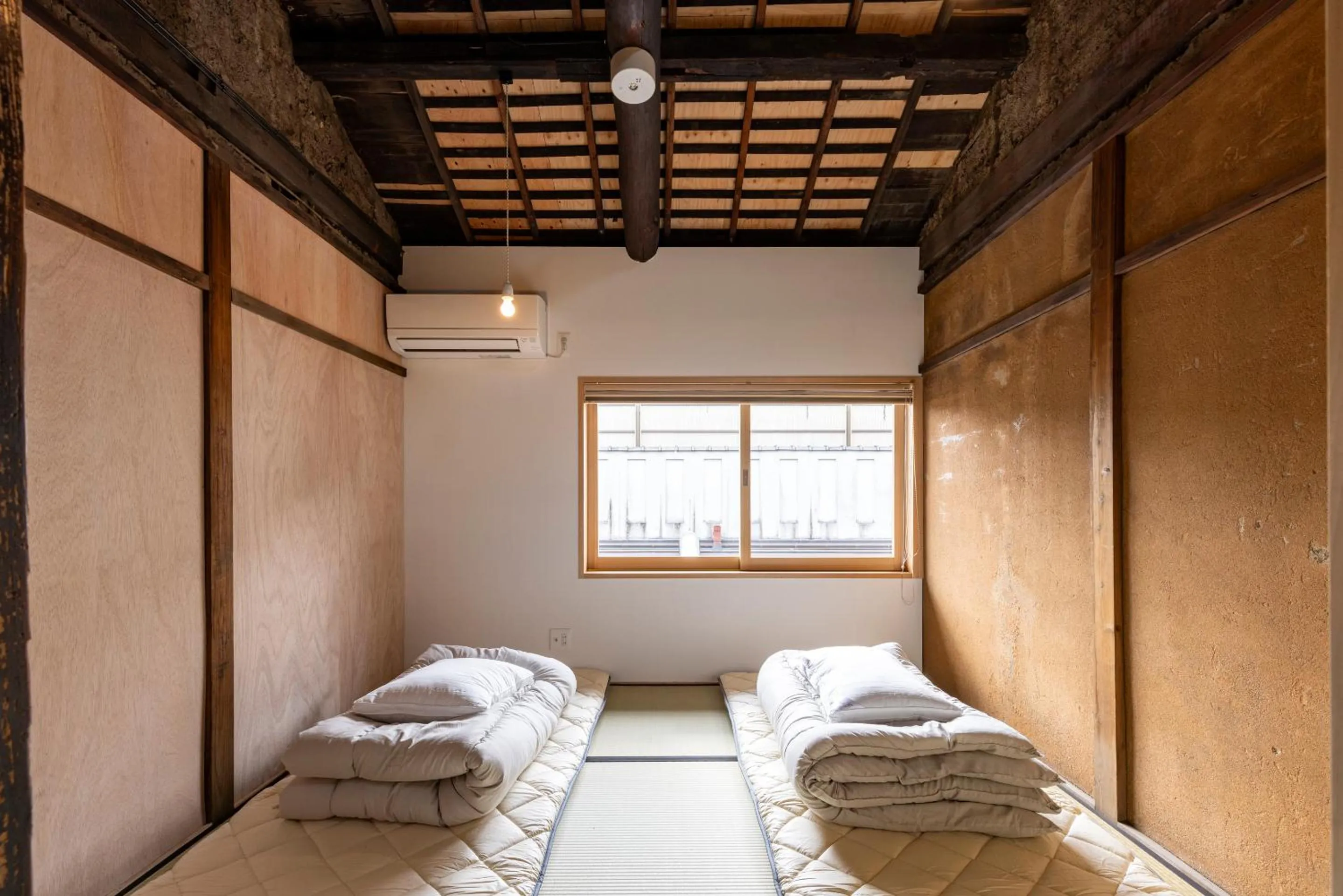 Bed in Machiya Hotel YANAGI