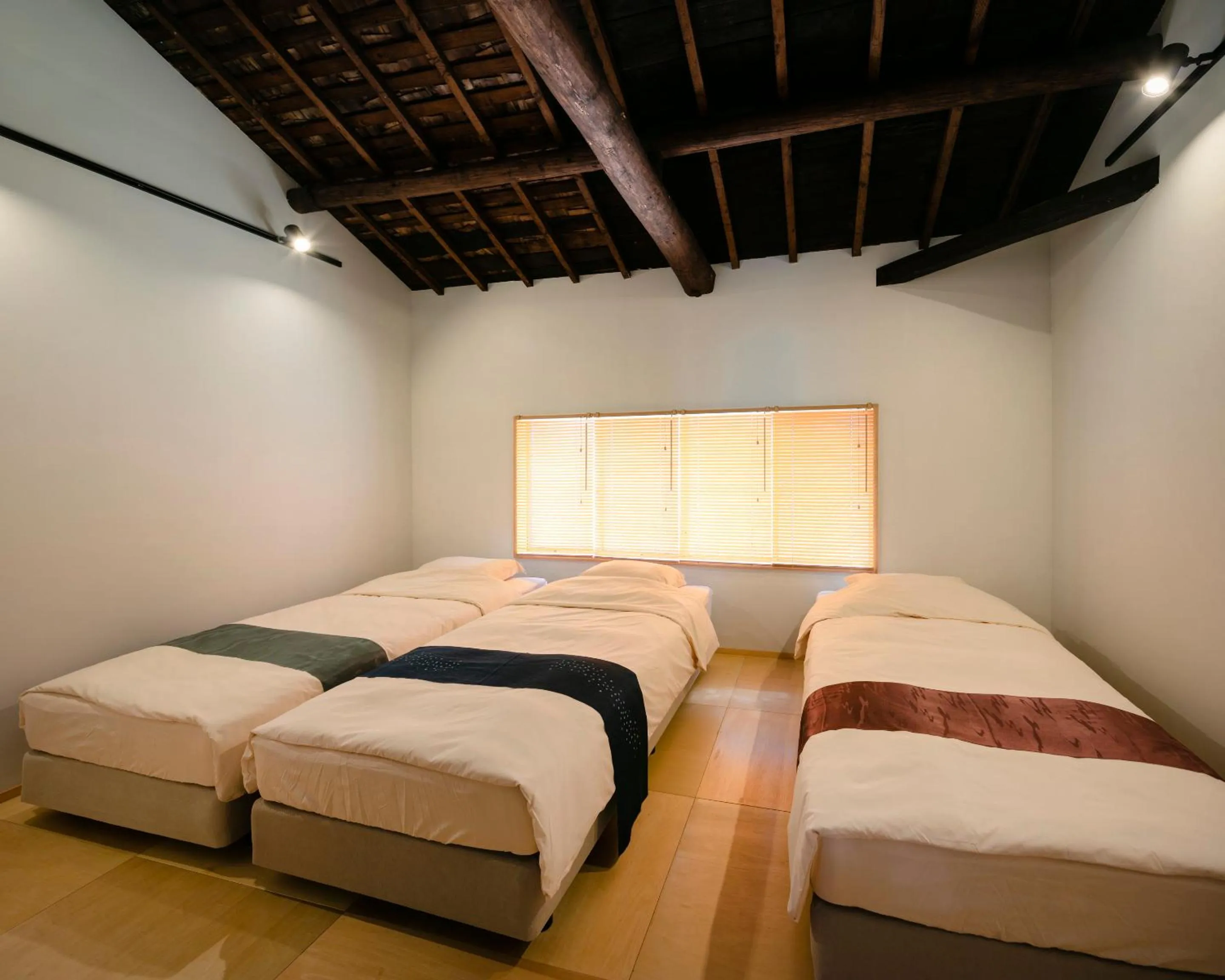 Bed in Machiya Hotel YANAGI