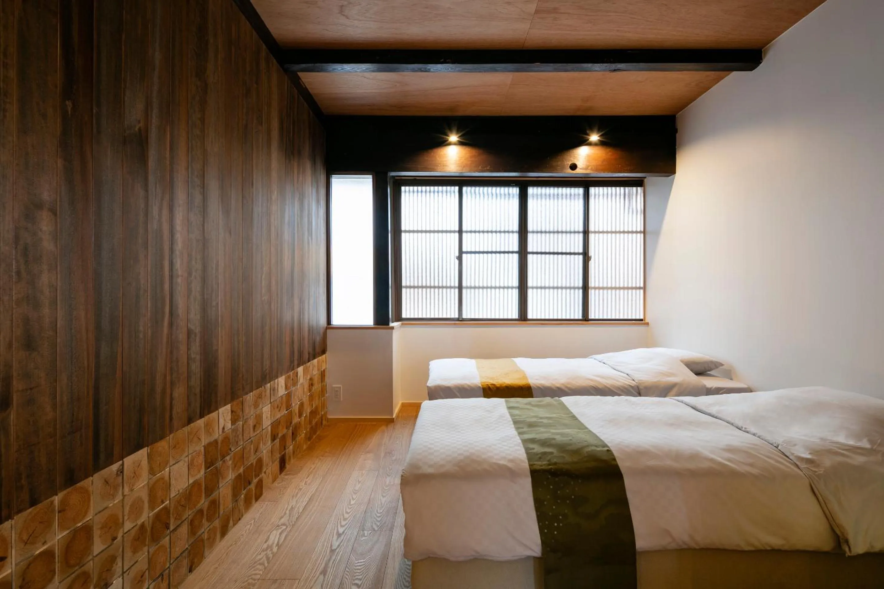 Bed in Machiya Hotel YANAGI