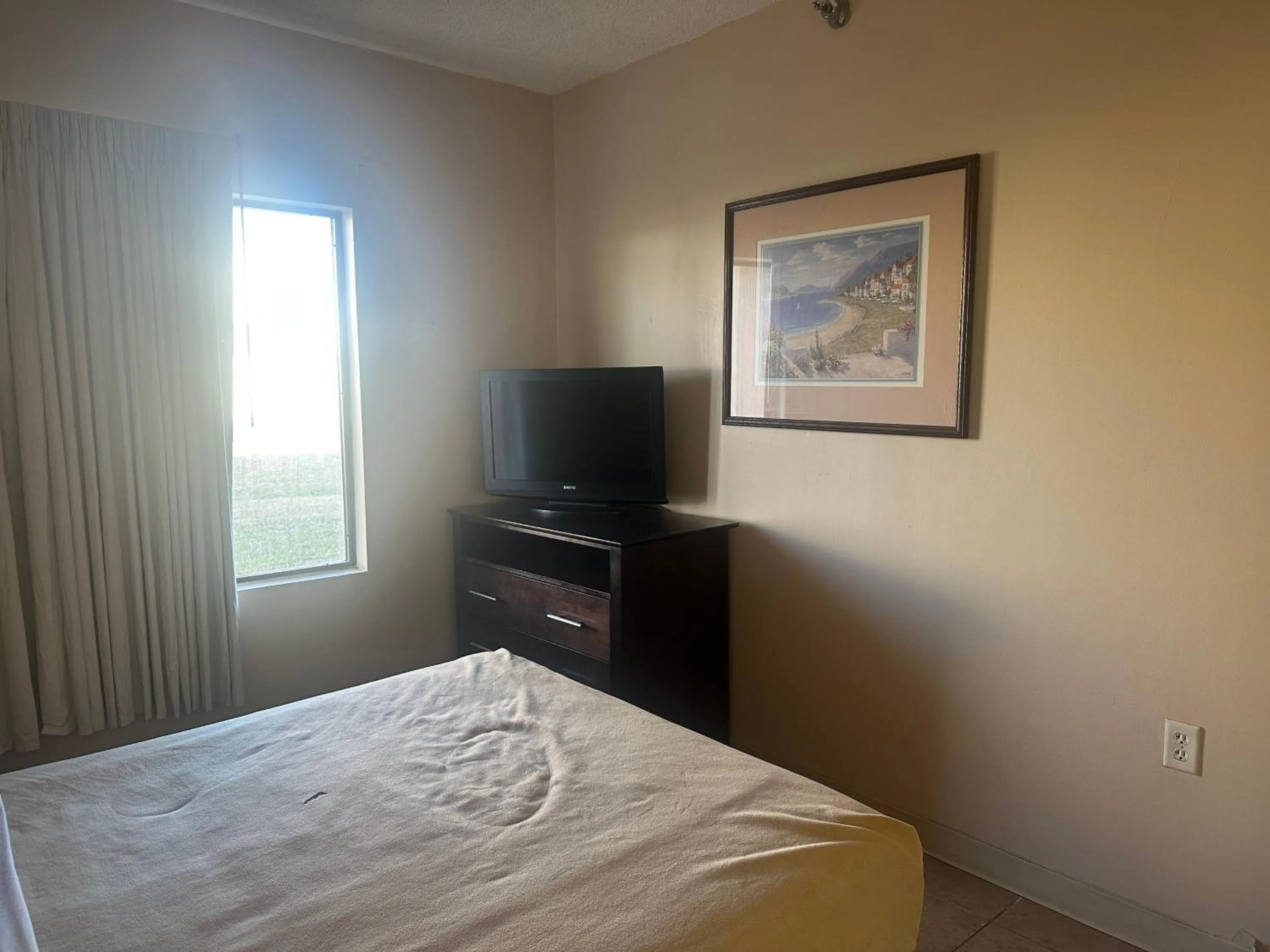 Bedroom in Guest Cottage & Suites By OYO Brunswick-Golden Isles