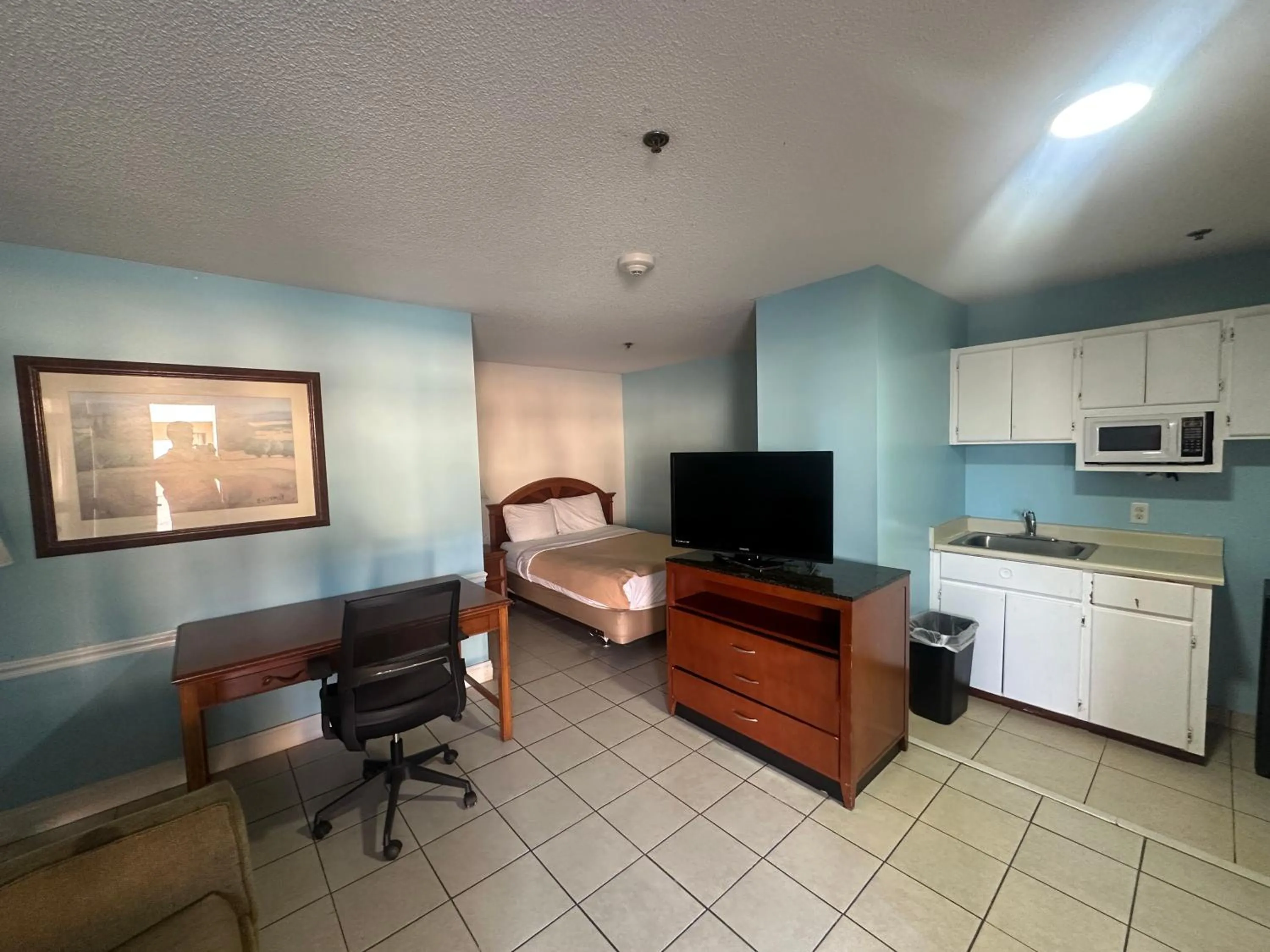 Bedroom in Guest Cottage & Suites By OYO Brunswick-Golden Isles