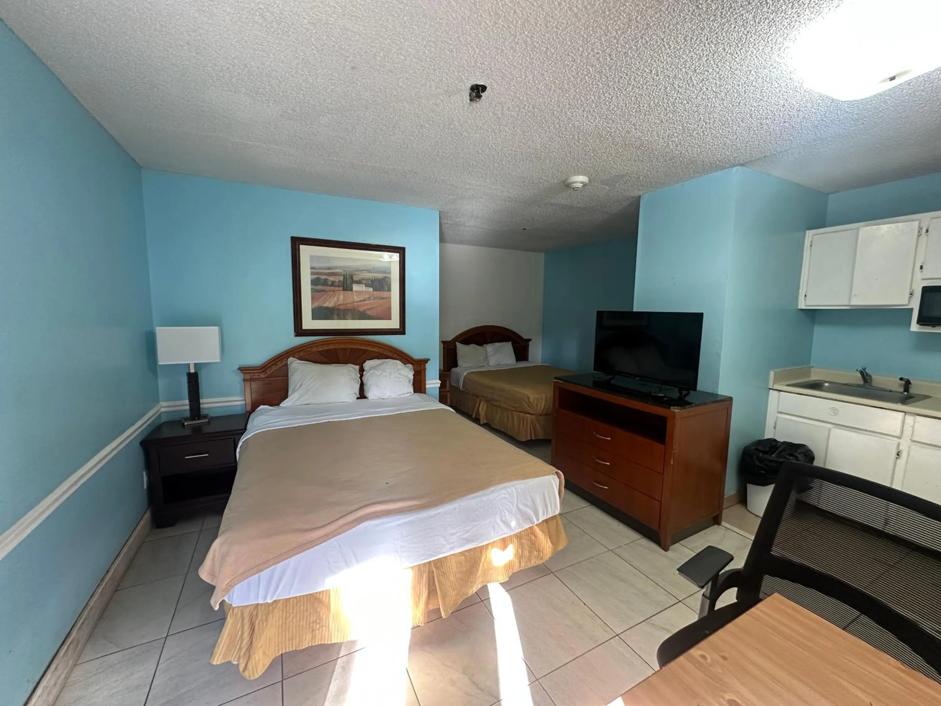 Bedroom in Guest Cottage & Suites By OYO Brunswick-Golden Isles