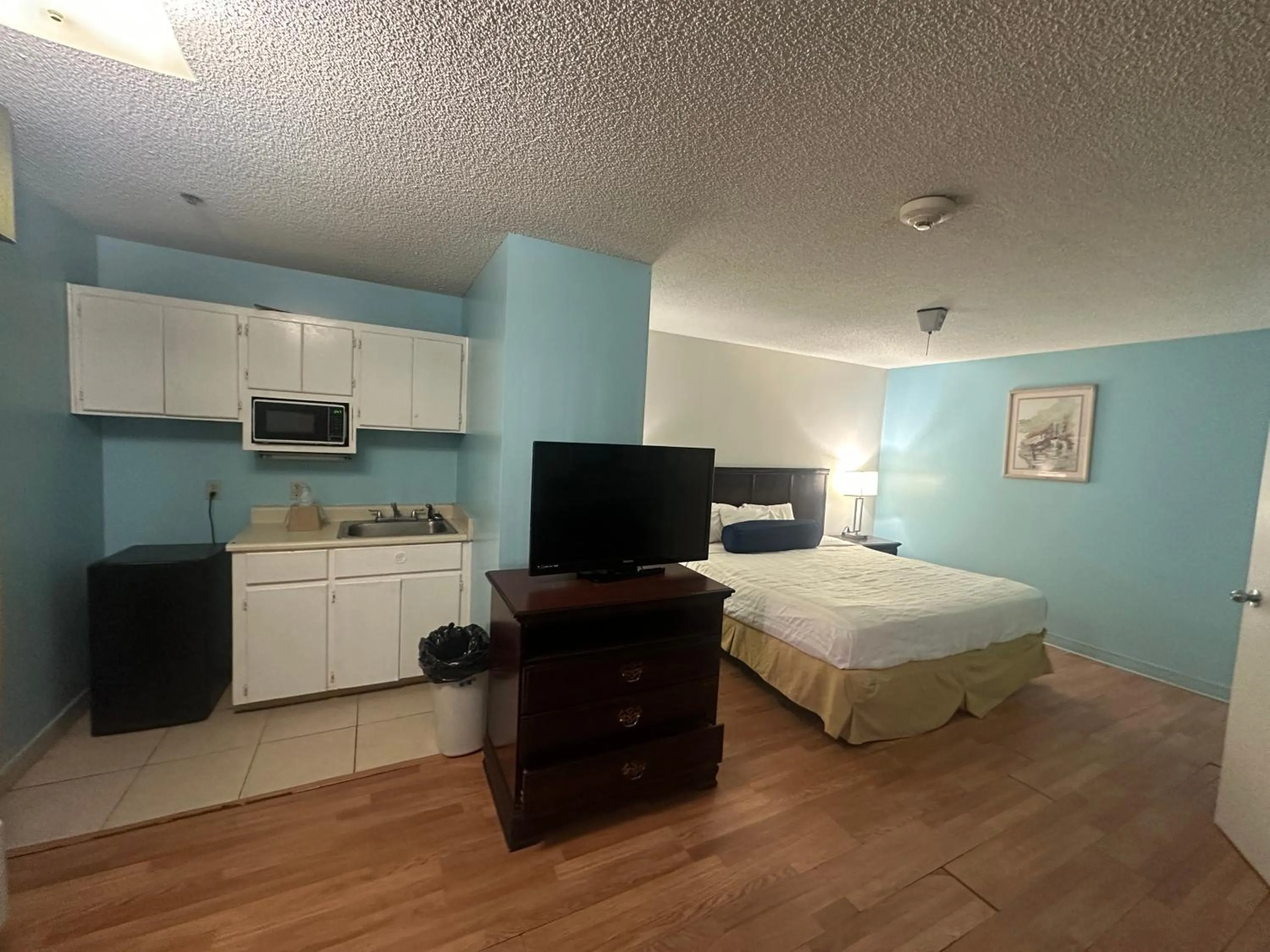 Bedroom in Guest Cottage & Suites By OYO Brunswick-Golden Isles