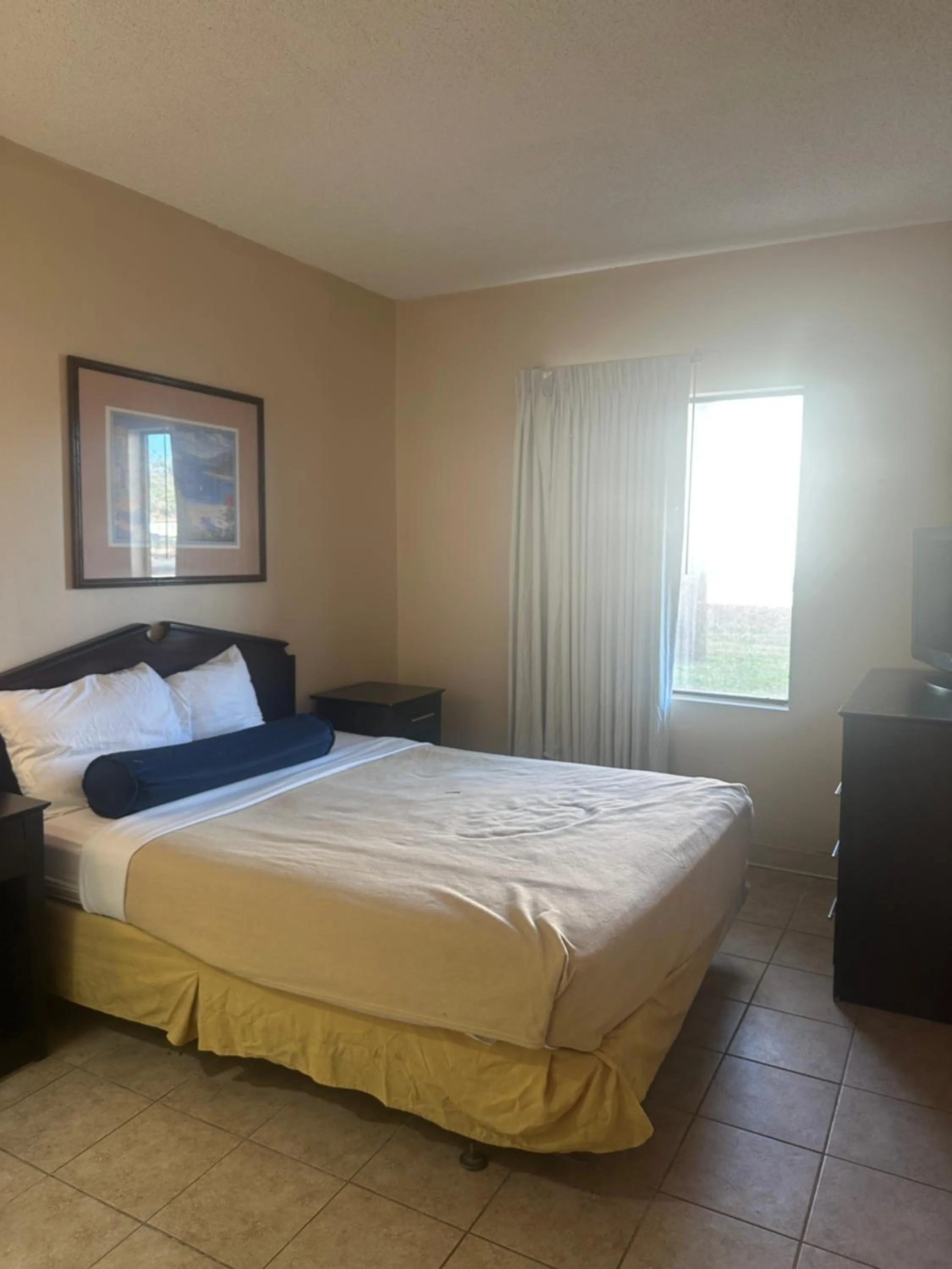 Bedroom in Guest Cottage & Suites By OYO Brunswick-Golden Isles