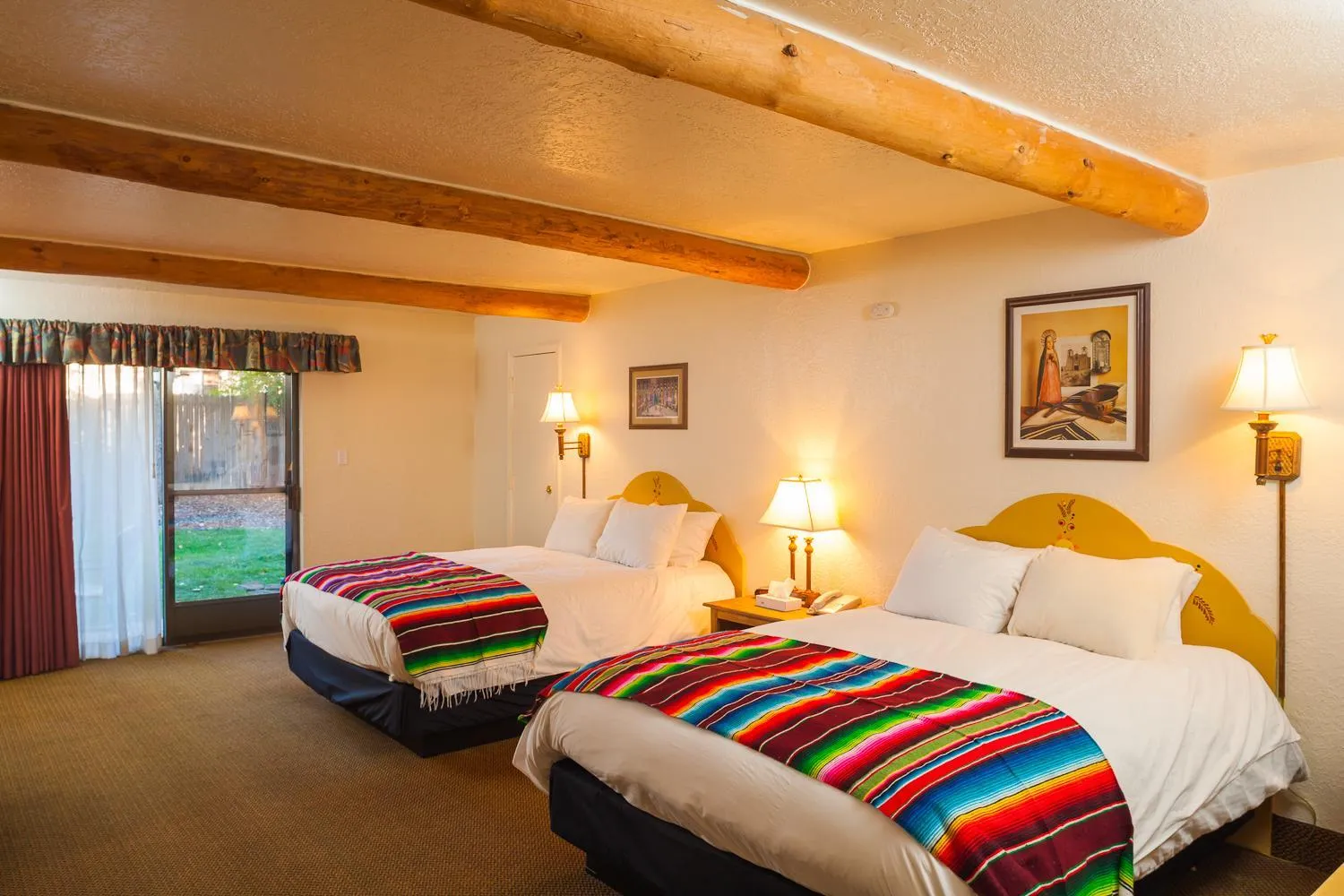 Bed in El Pueblo Lodge