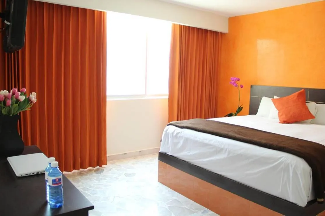 Bed in Hotel María Eugenia Tuxtla Gutiérrez