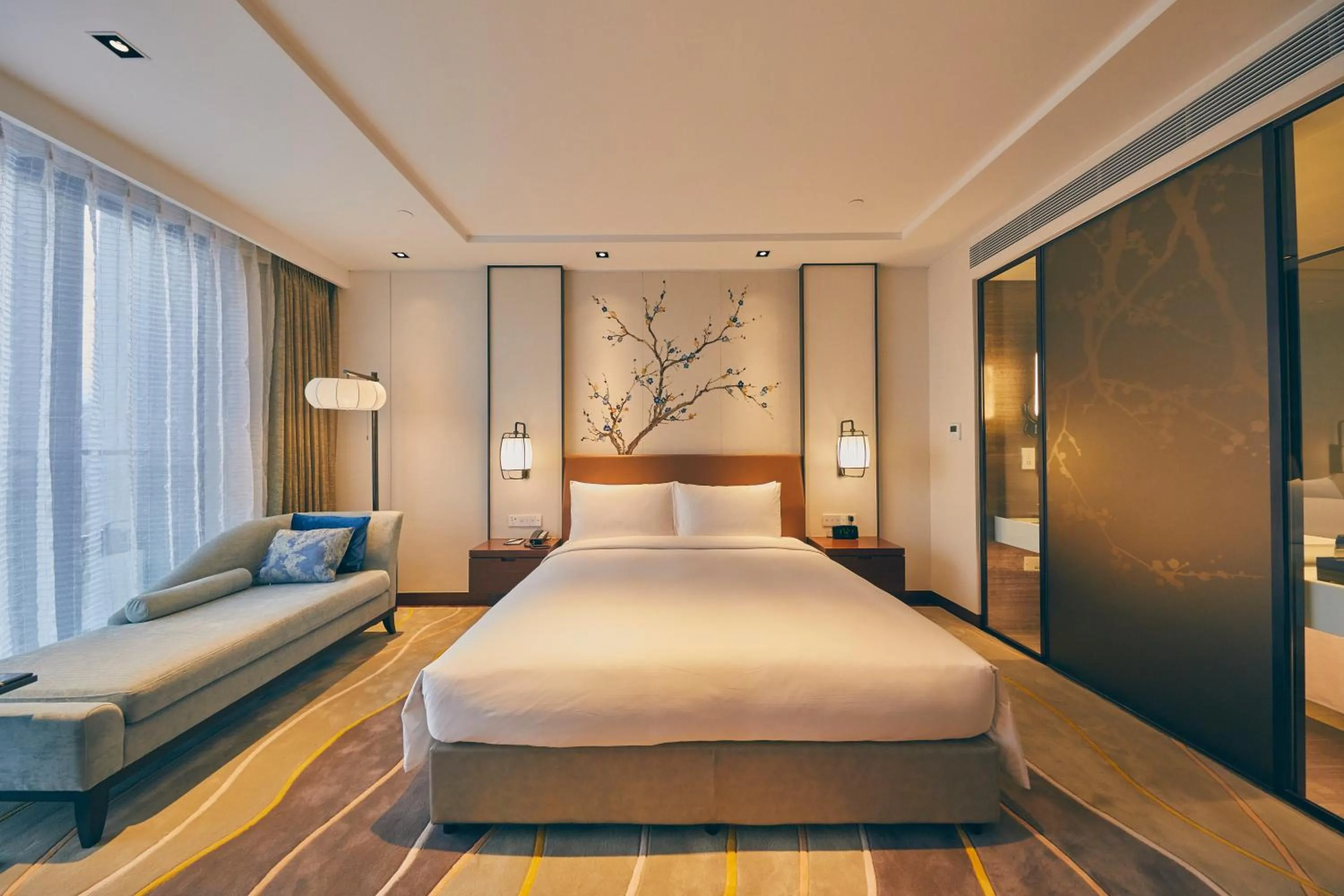 Bed in LJZ Supreme Tower Hotel