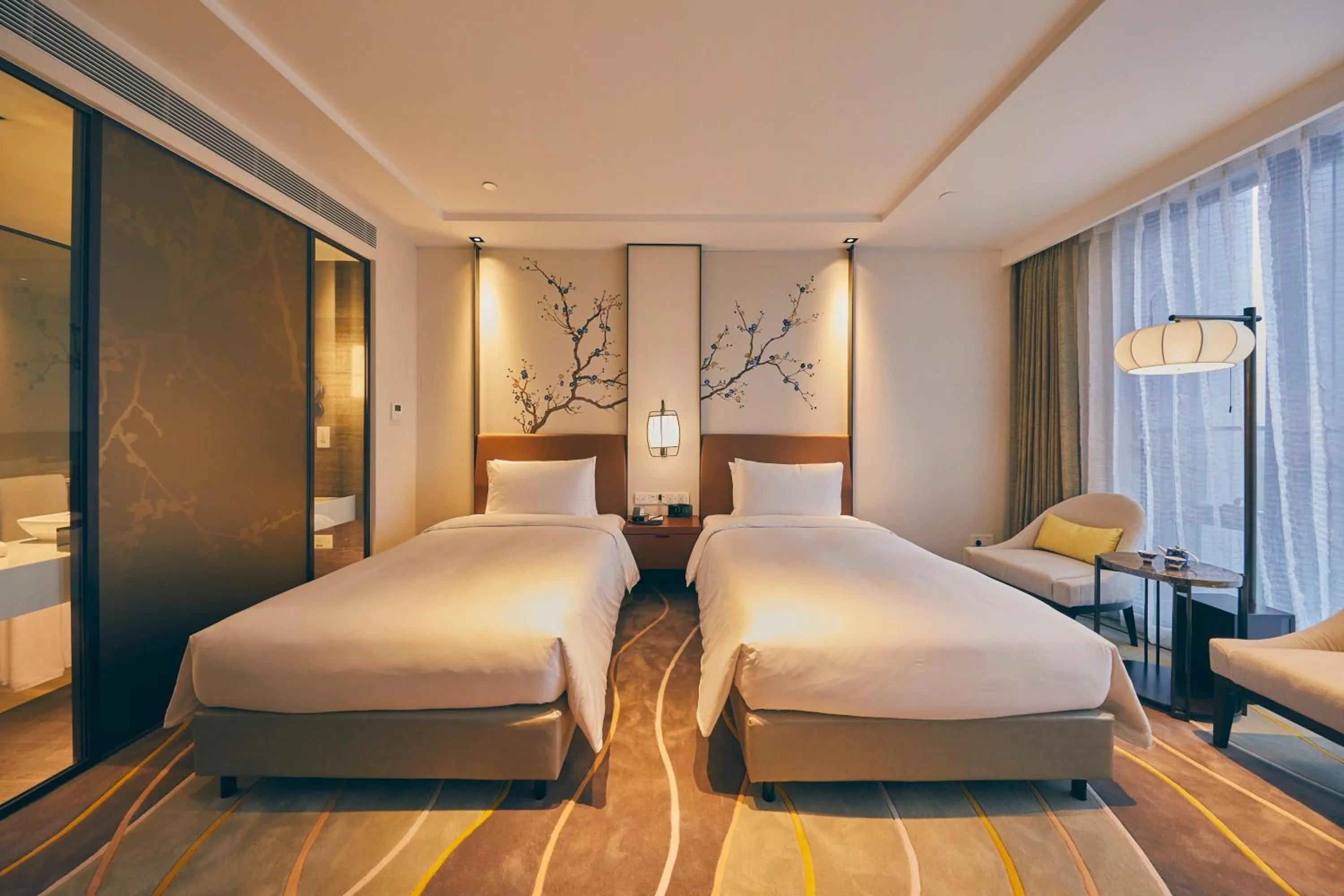 Bed in LJZ Supreme Tower Hotel