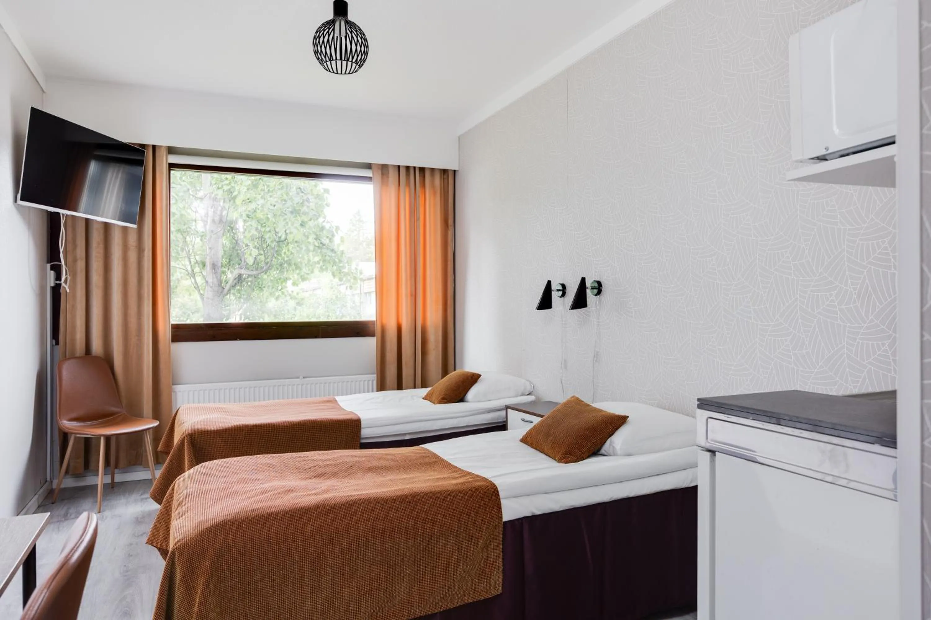 Bed in Hotel Käenpesä