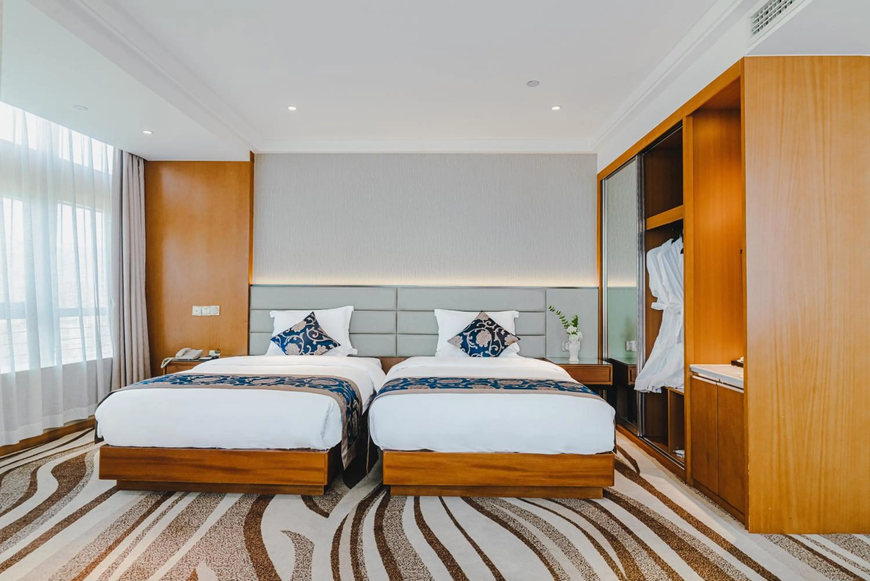 Bed in Wenzhou Hangbin International Hotel