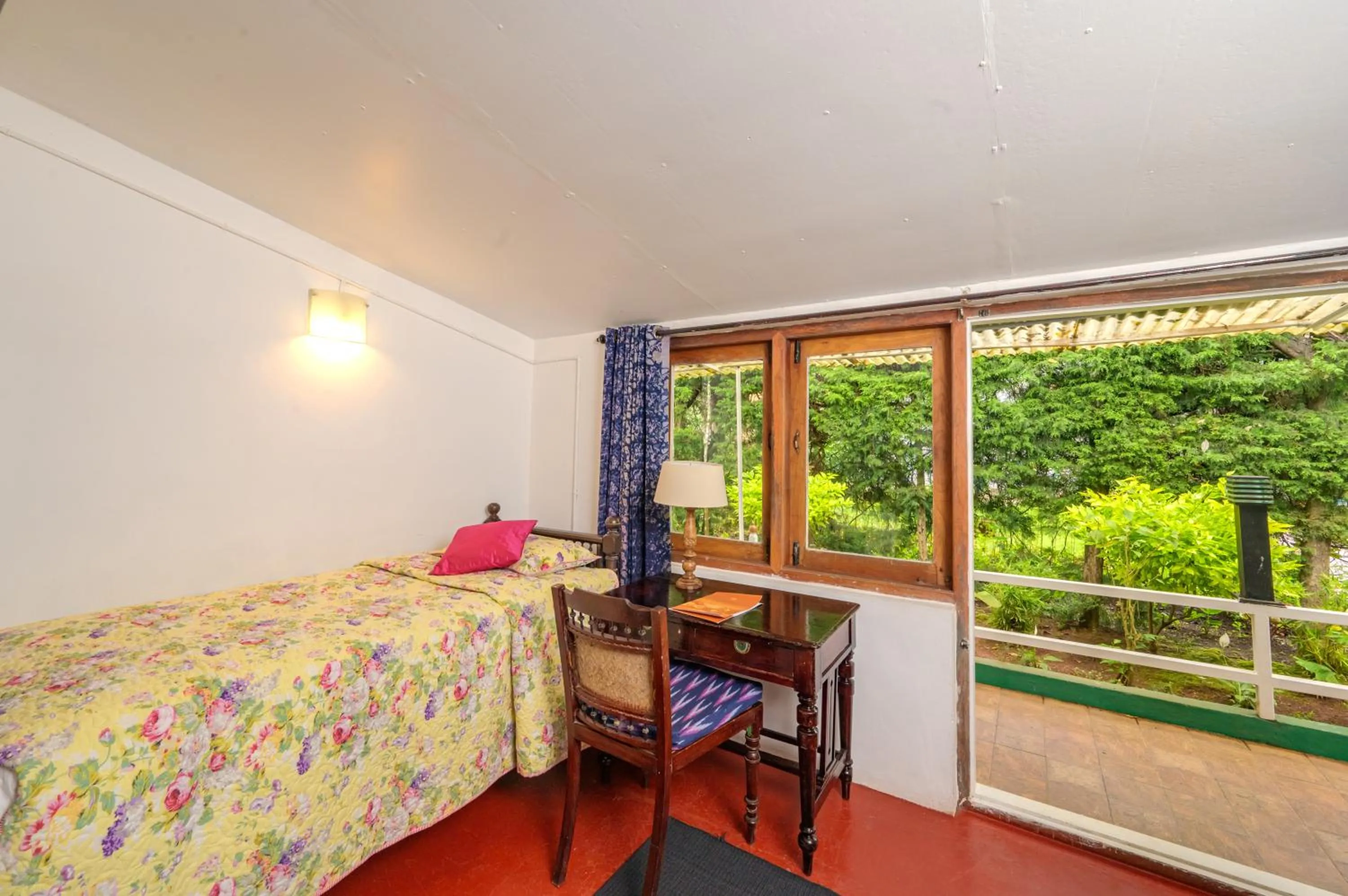 Bed in Neemrana's Wallwood Garden